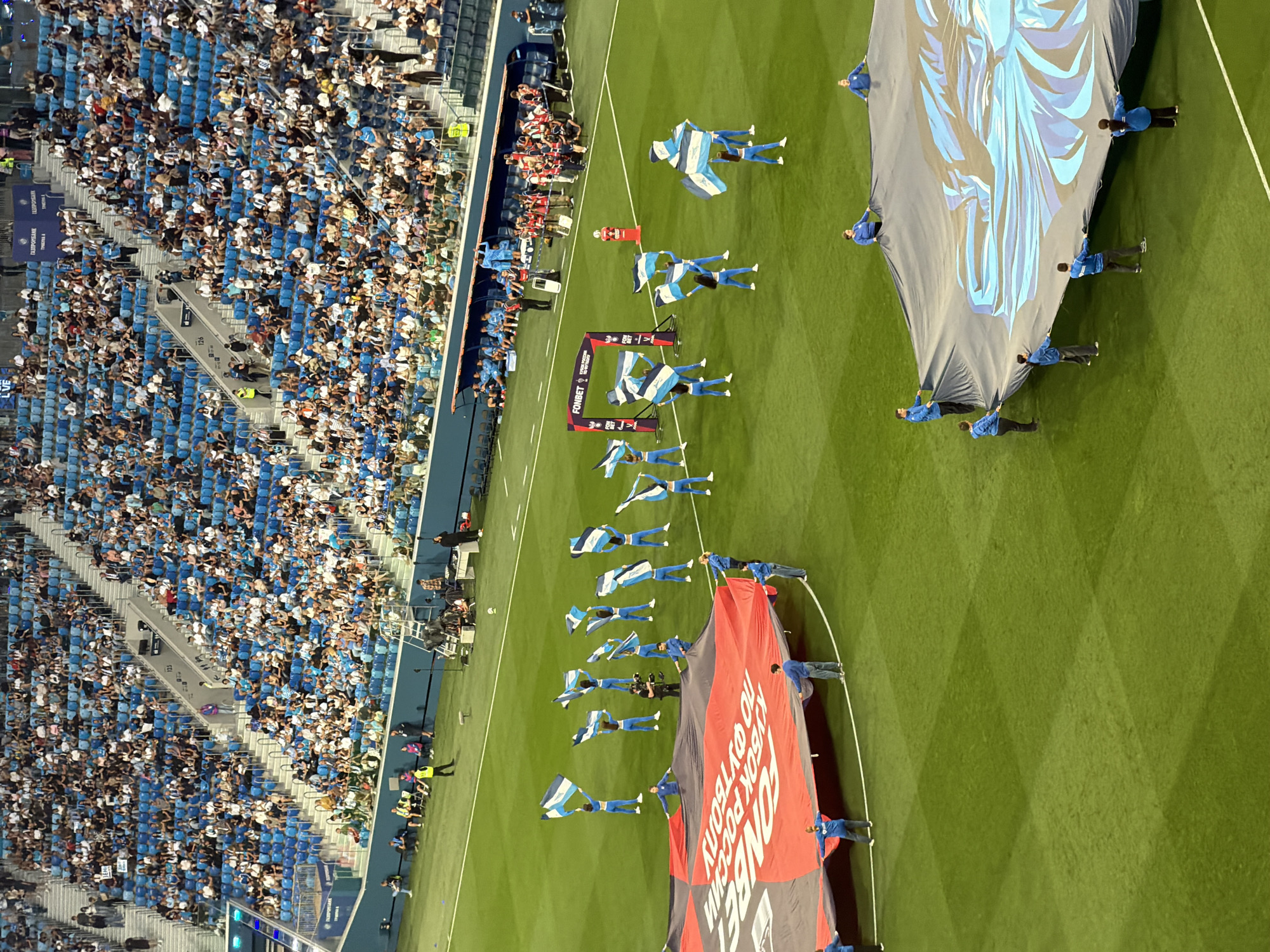 Football match kicks off at packed Russian stadium