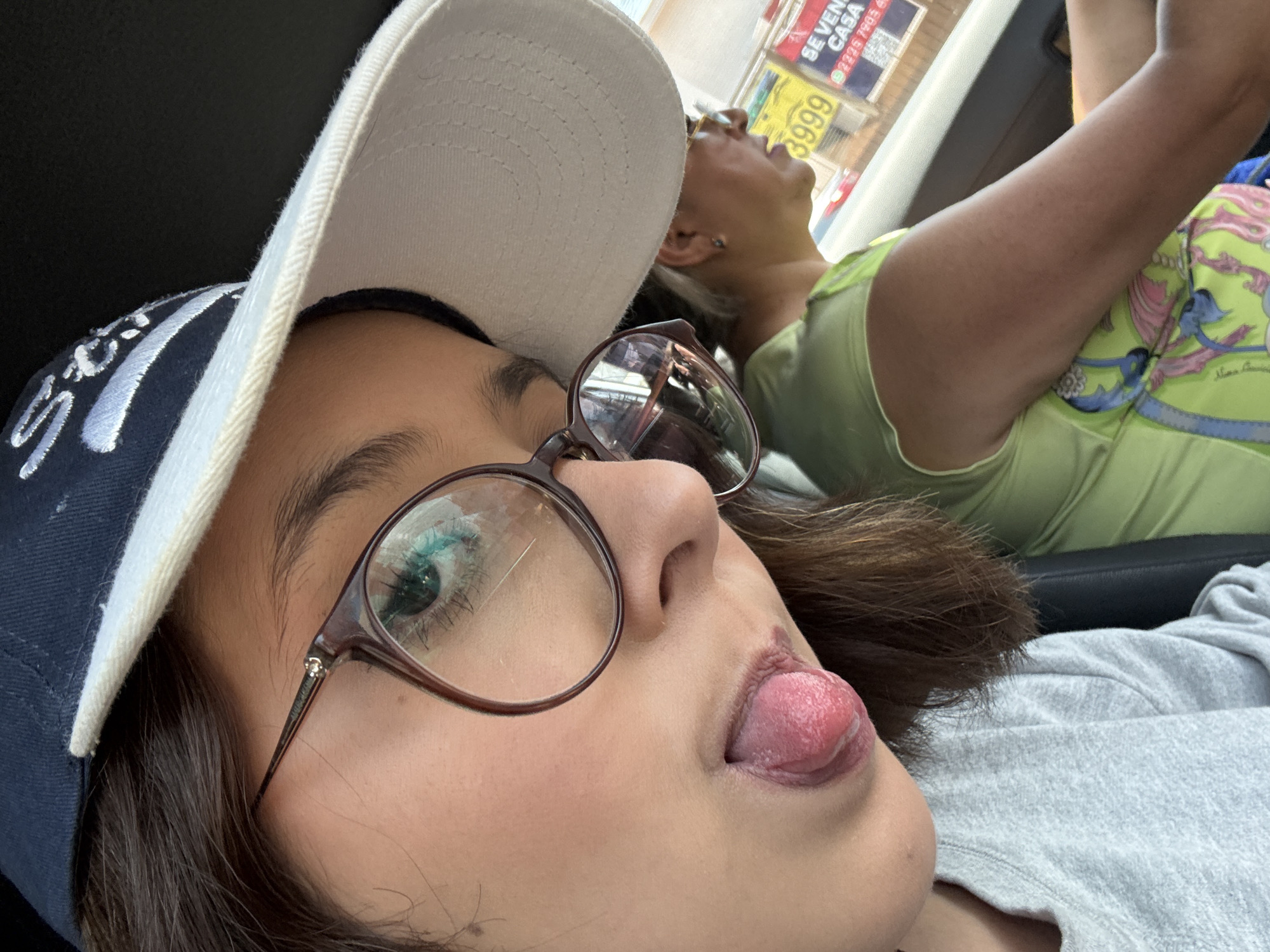 Woman takes car selfie in Puebla, Mexico