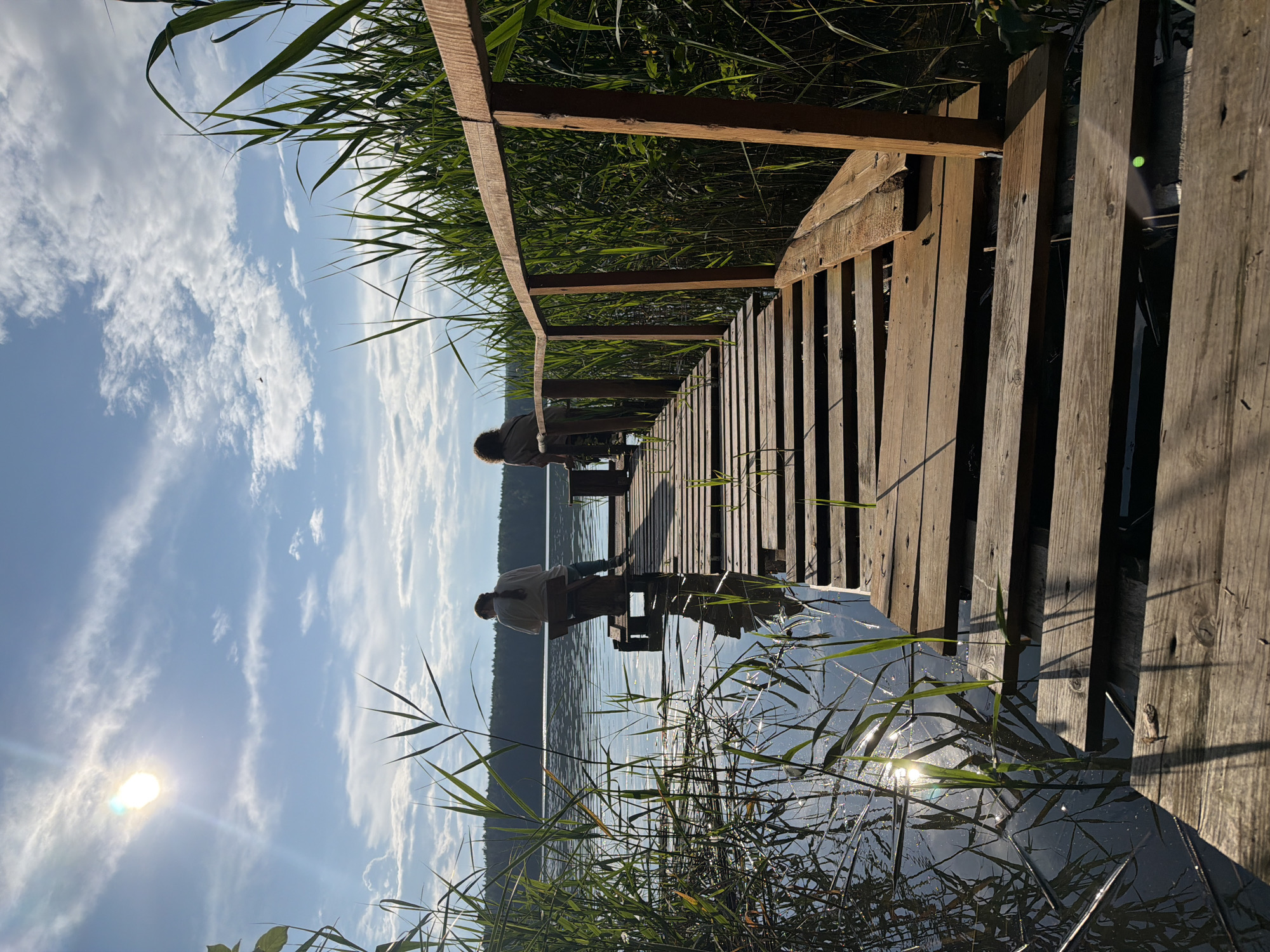 Lazy summer afternoon on a lakeside pier in Votkinsk
