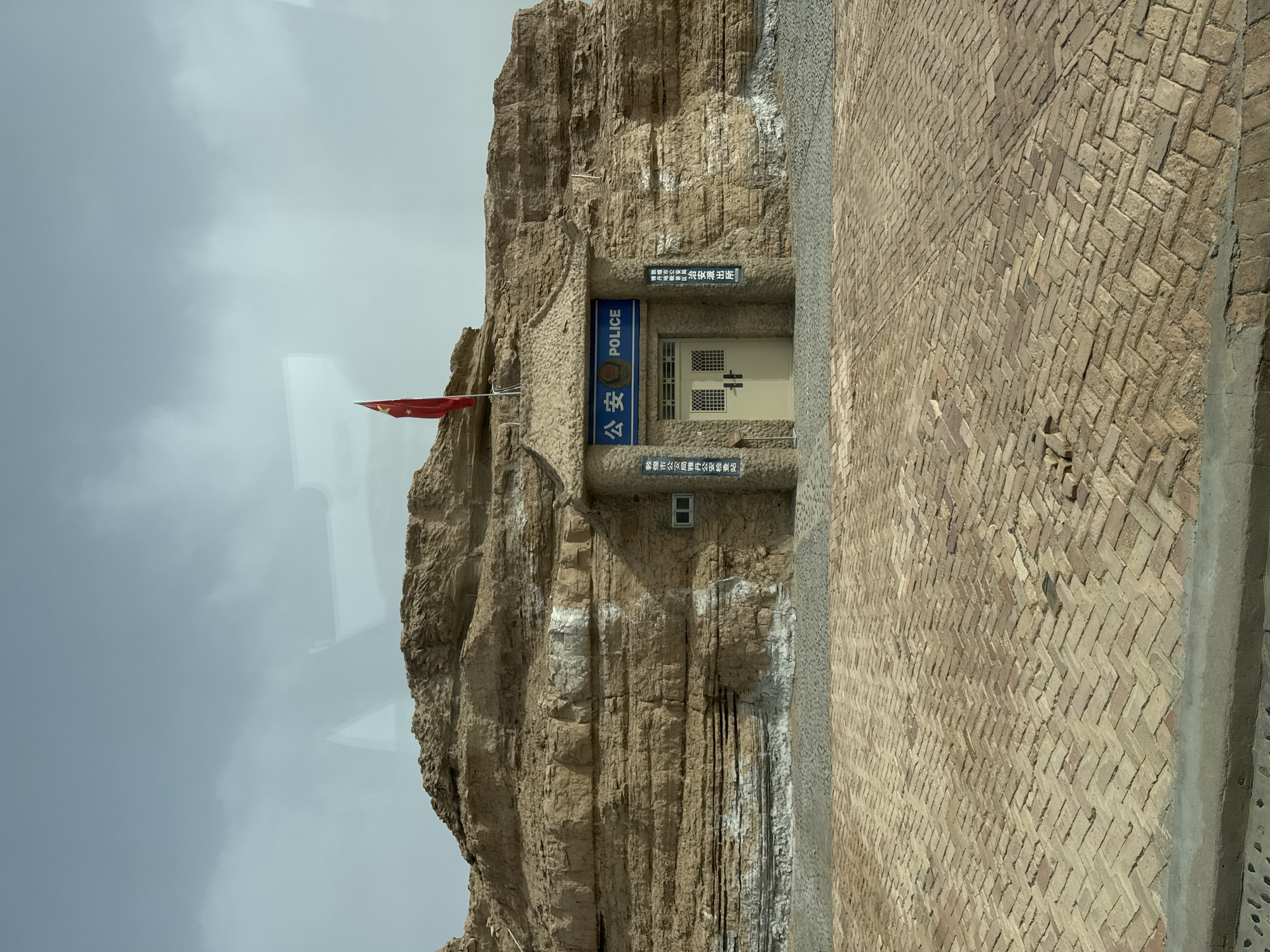 Rock-carved police station documented in Dunhuang, China