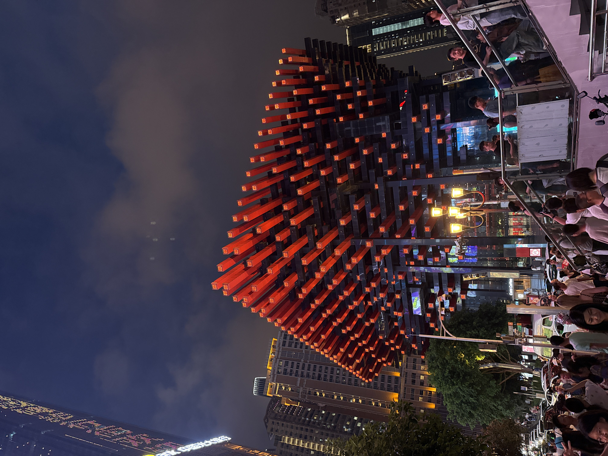 Hongyadong complex glowing at night in Chongqing