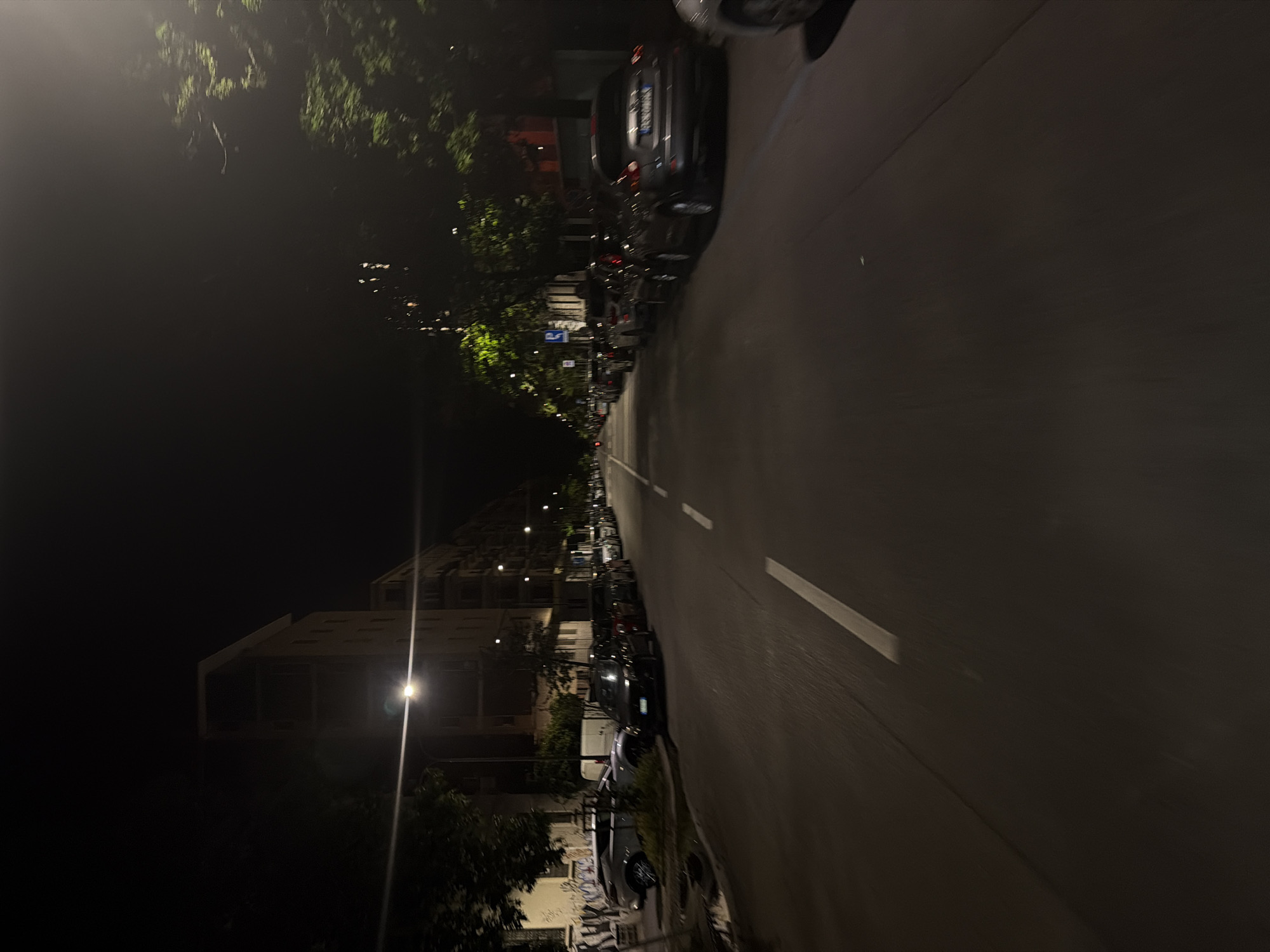 Quiet nighttime street scene captured in Milan
