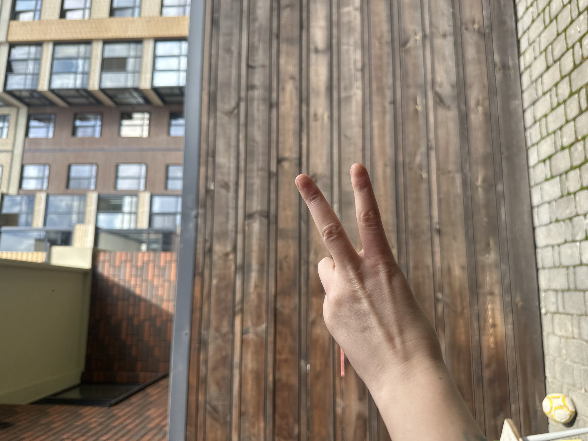 Casual morning moments around a brick apartment building