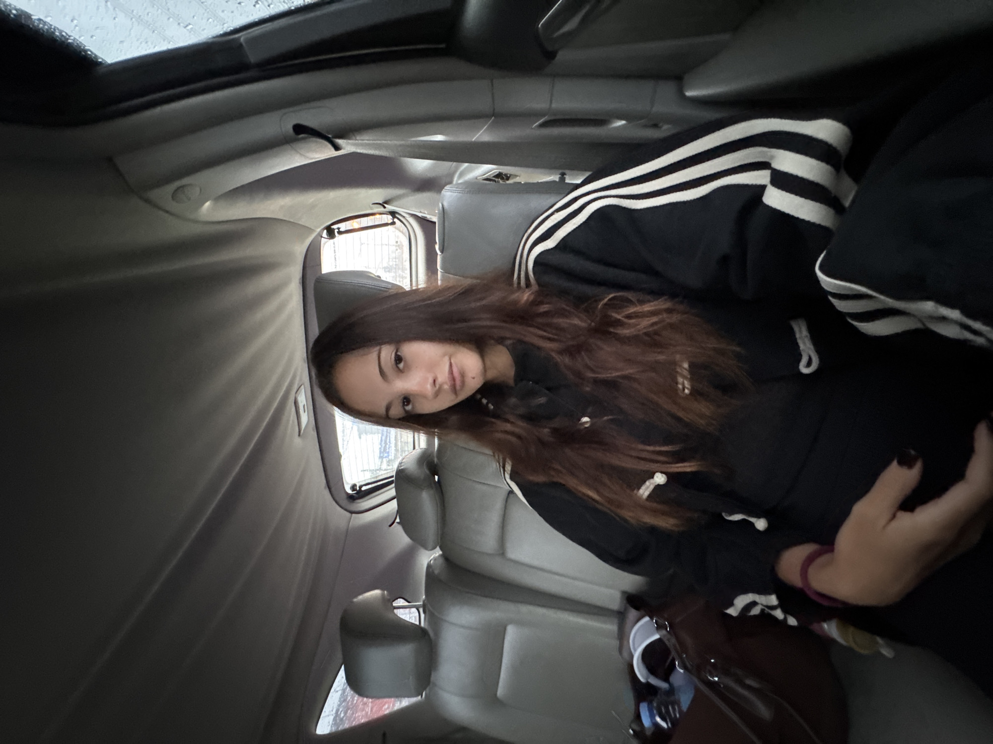 Woman travels as passenger through rainy Si Sunthon night