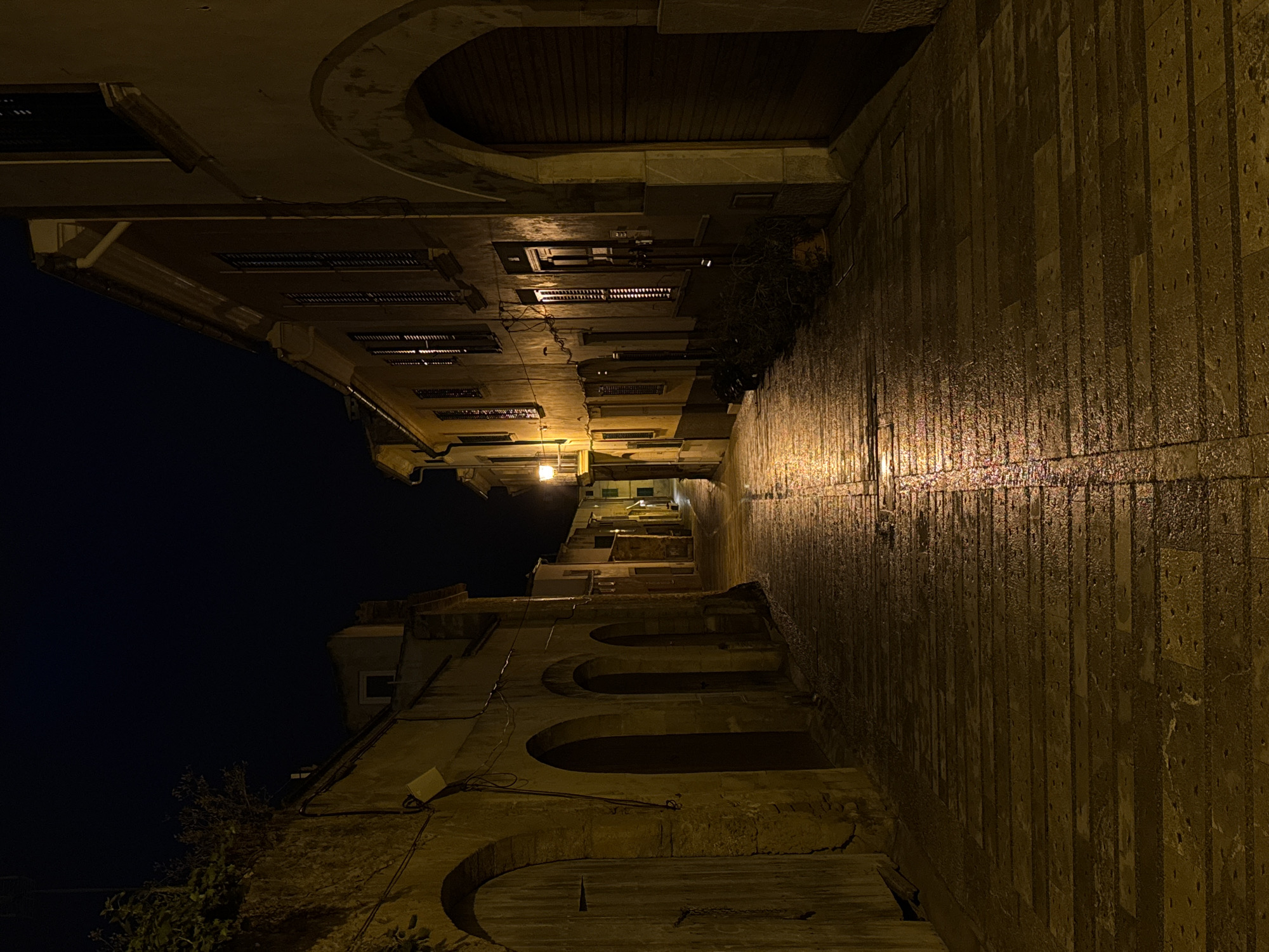 Nighttime street scene documented in historic Alcúdia, Spain