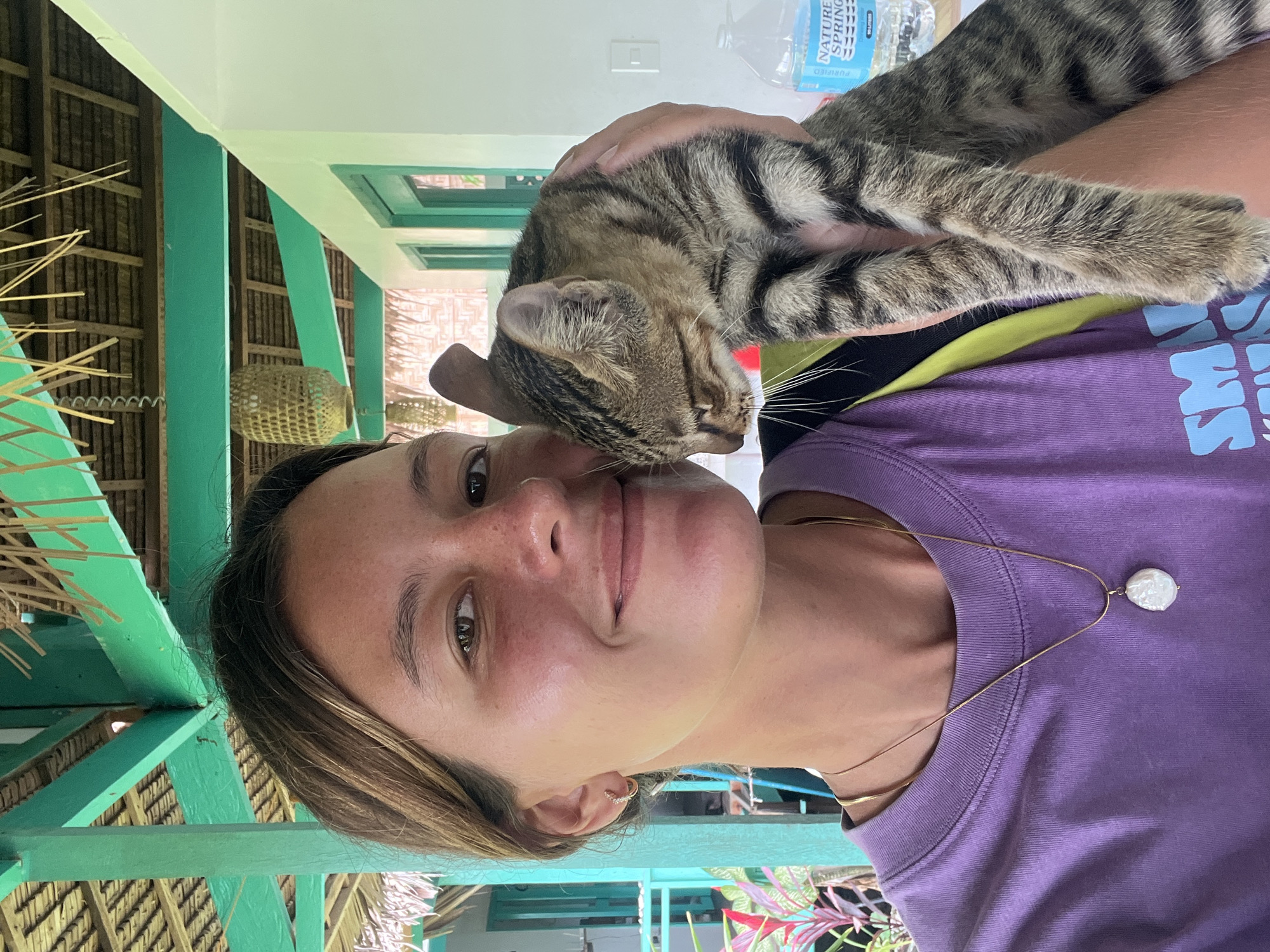 Selfies with a tabby cat in General Luna, Philippines