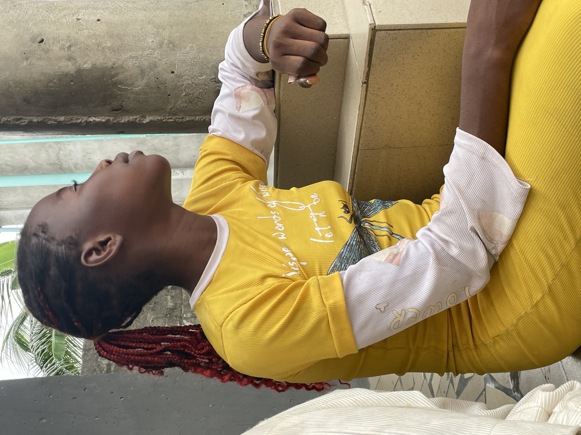 Children playing games and socializing outdoors in Badagry, Nigeria