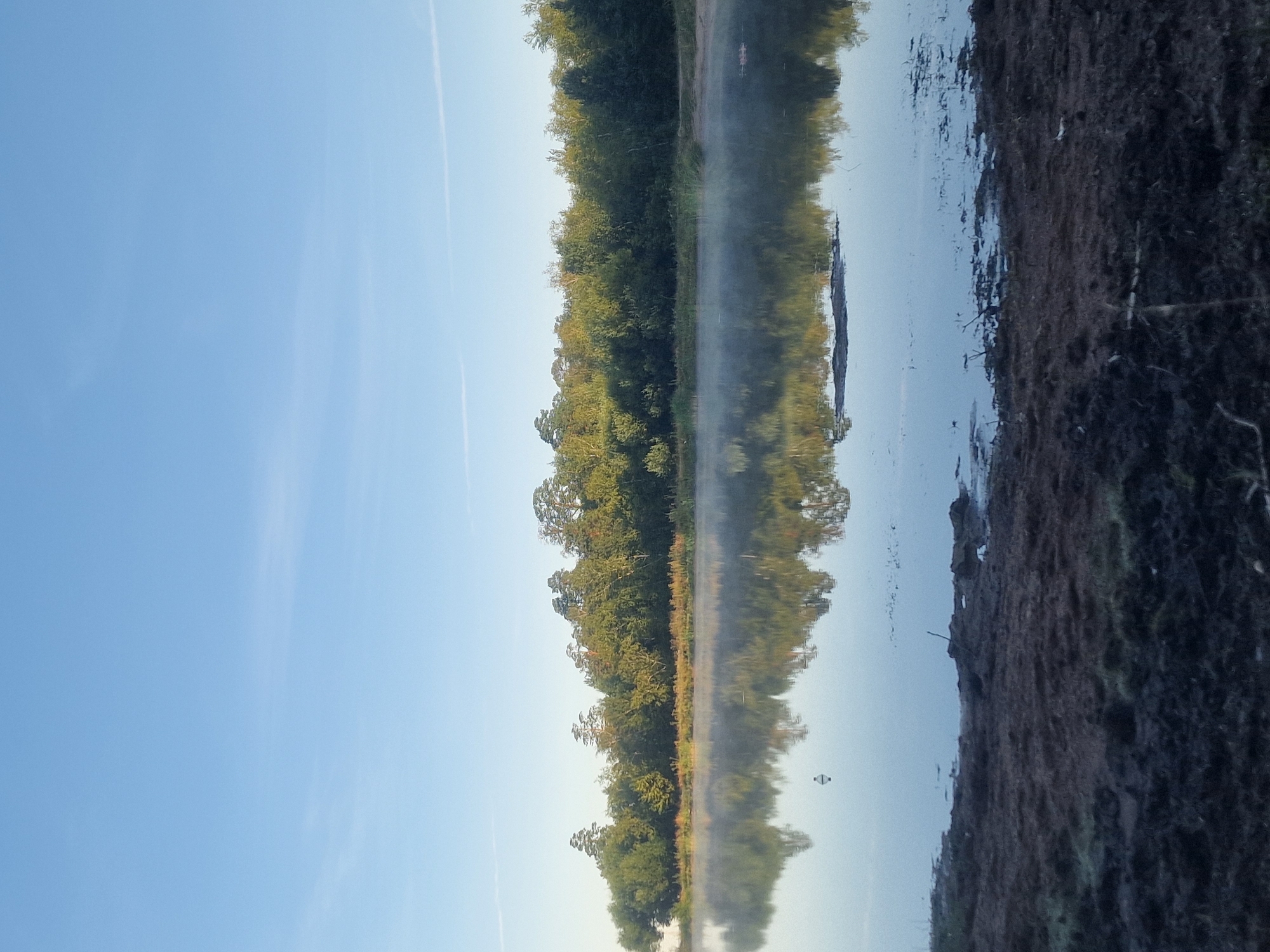 Lakeside and forest landscape near Makinsk at golden hour