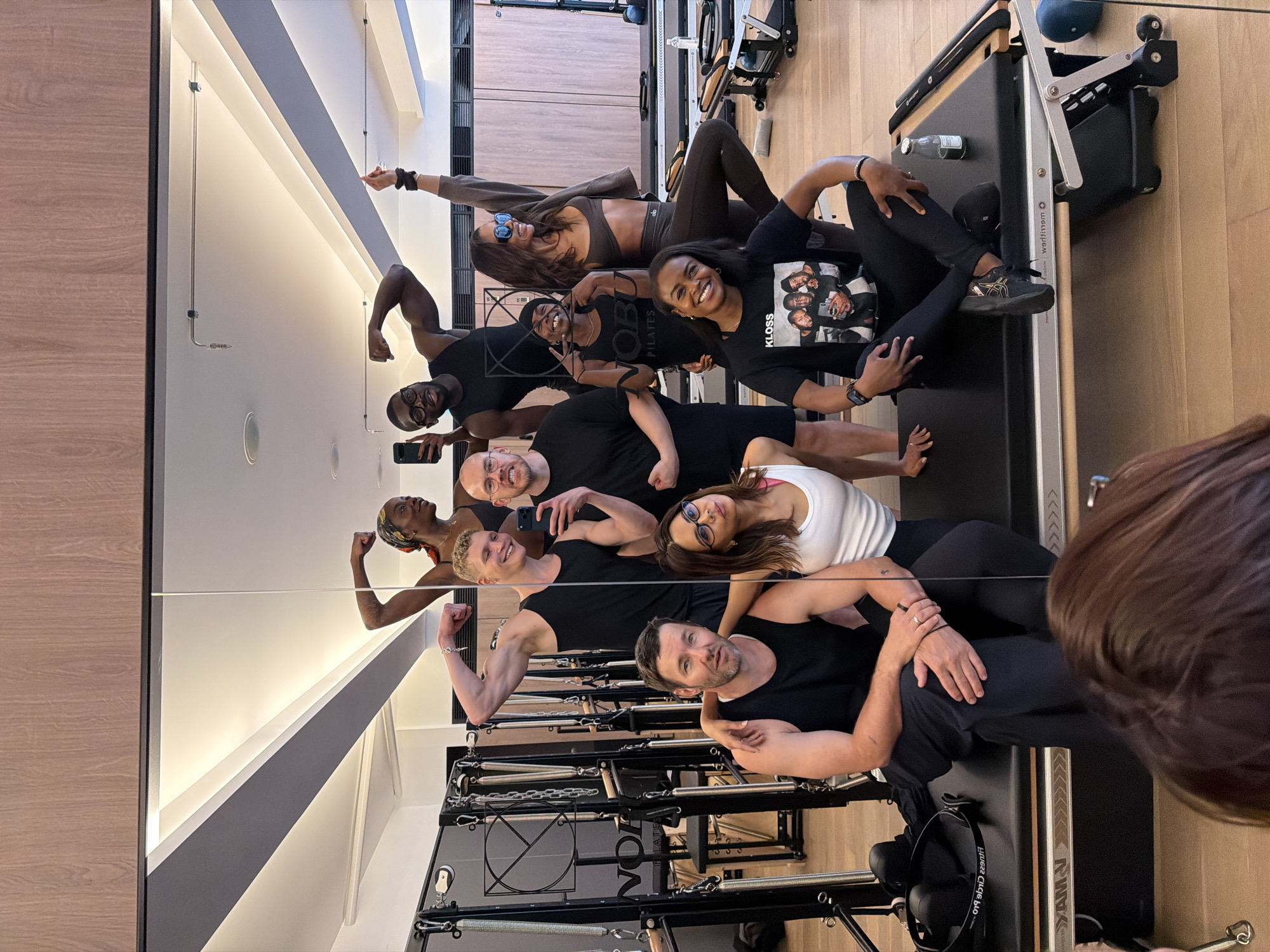 London Pilates class documented through participant selfies and workout footage