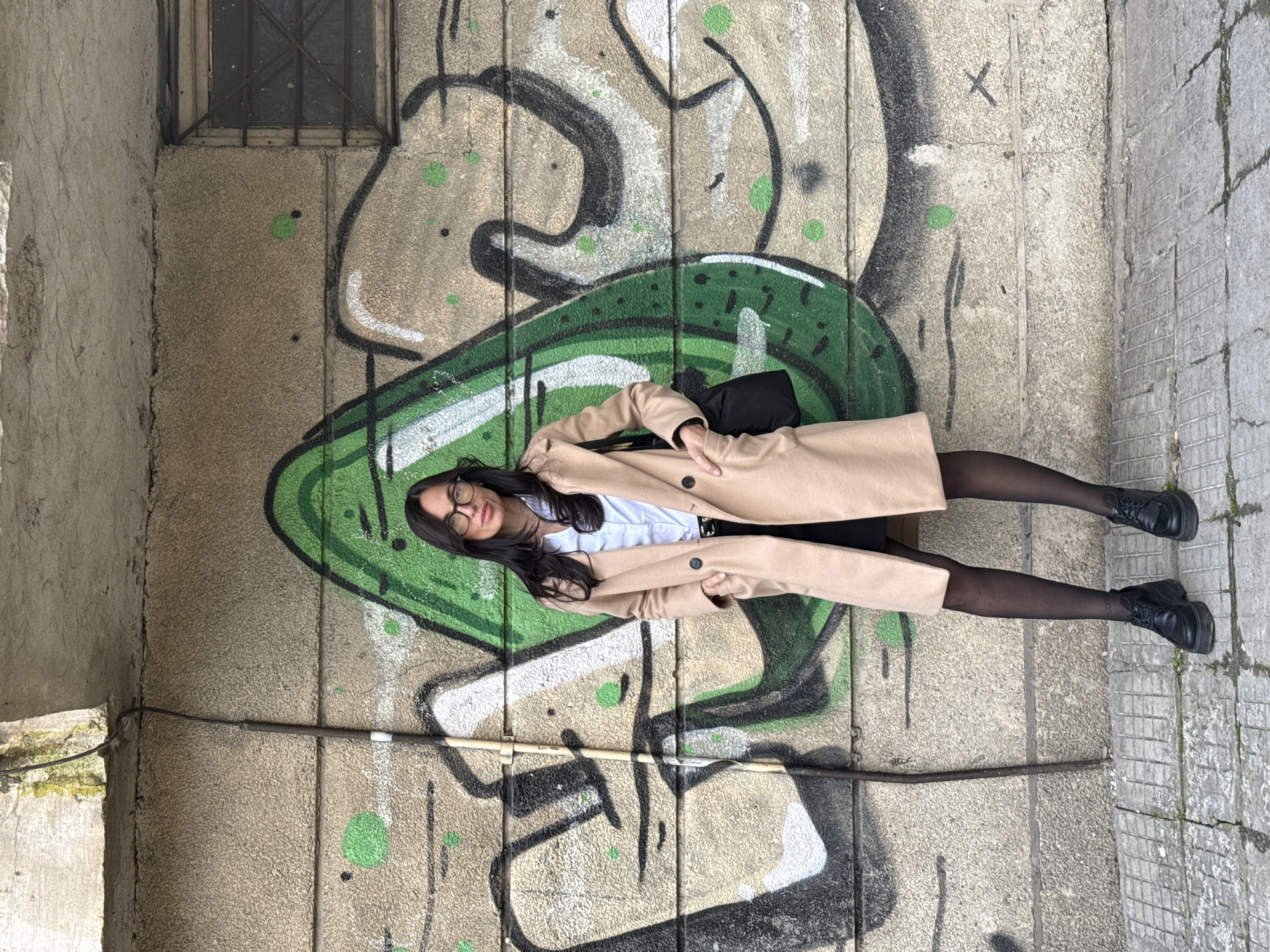 Woman poses for photos around Pleven during afternoon outing