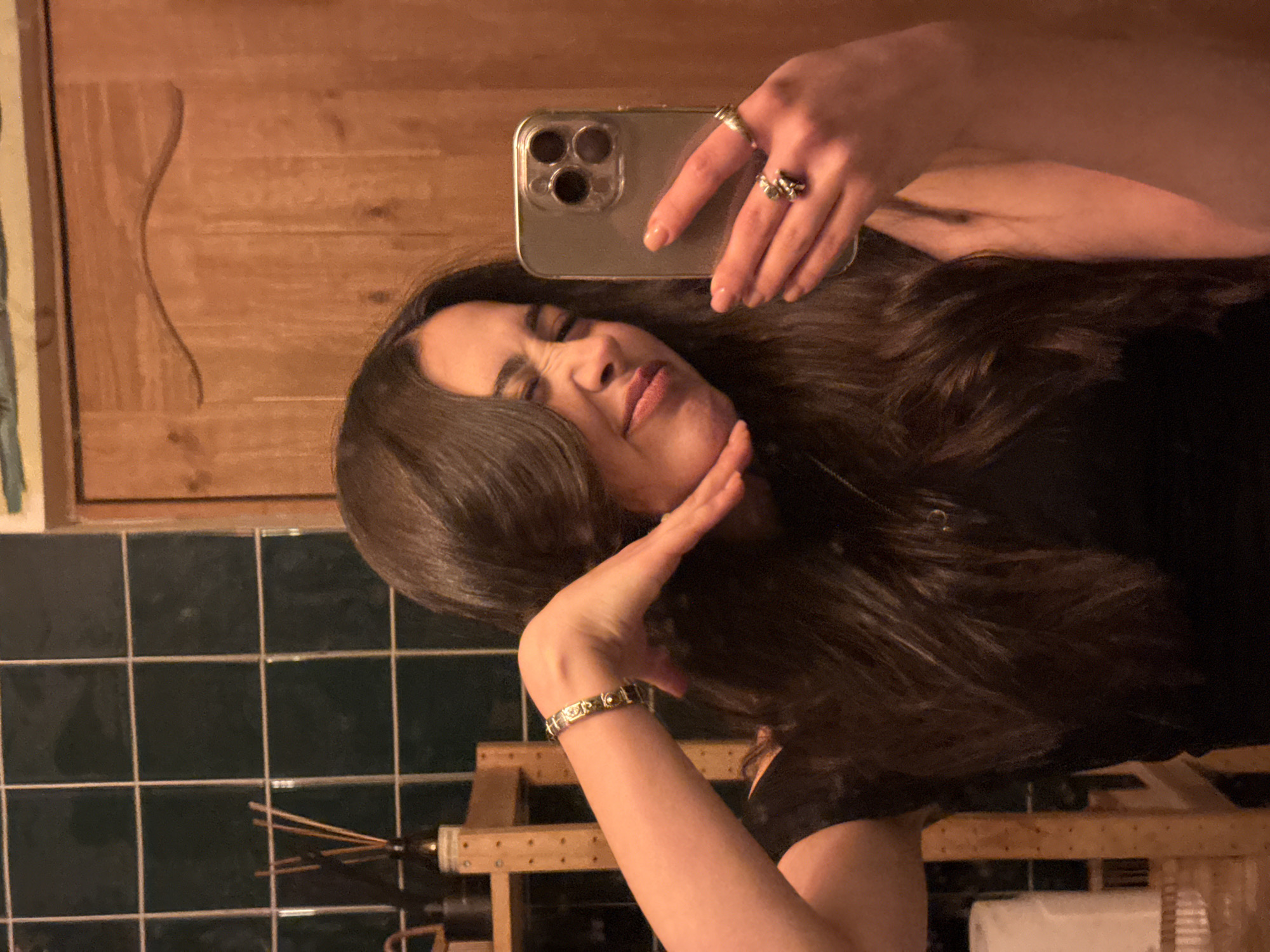 Woman takes bathroom selfies at Yerevan restaurant
