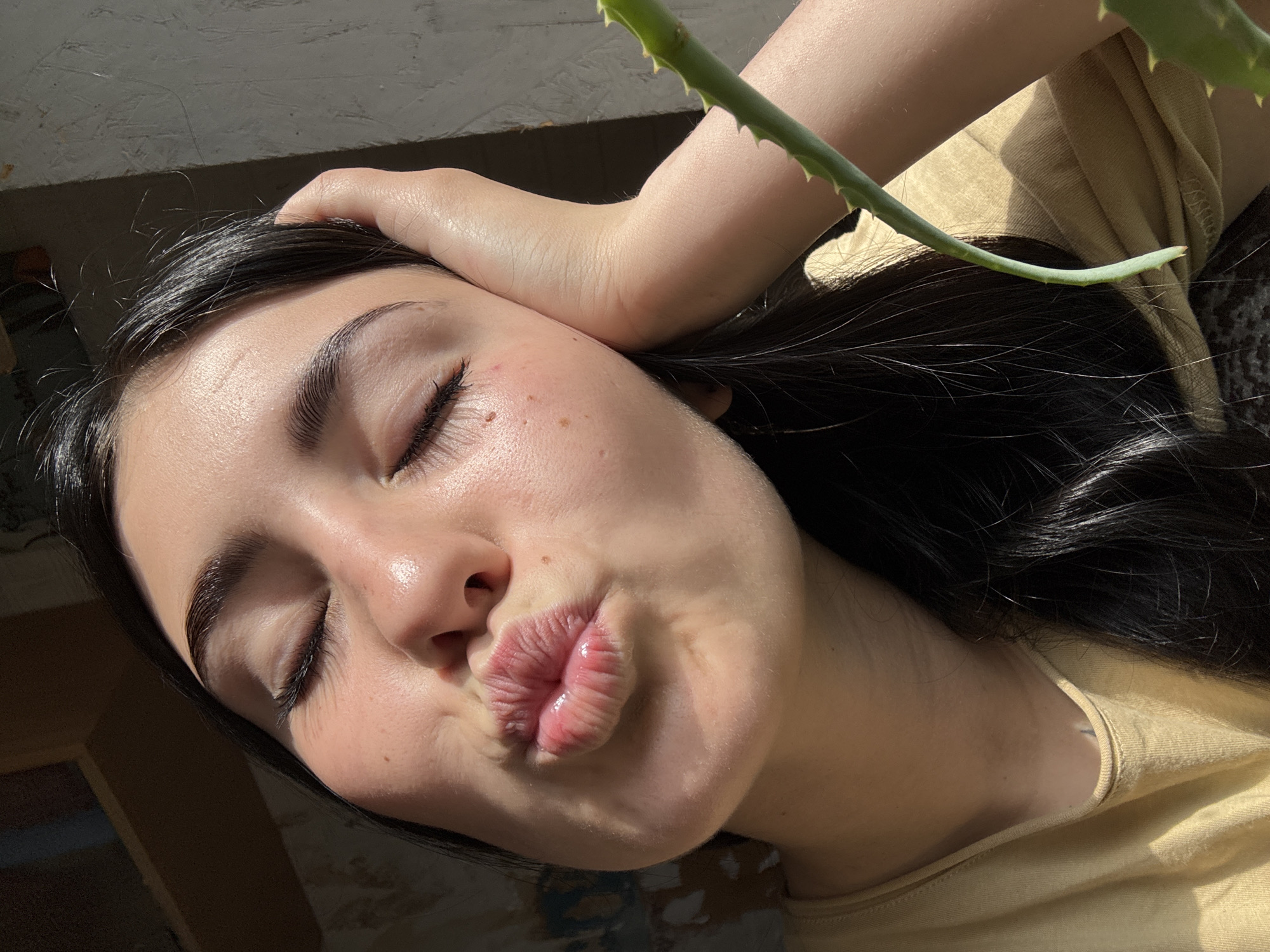 Selfies, sleeping cats, and a peony in Fokino