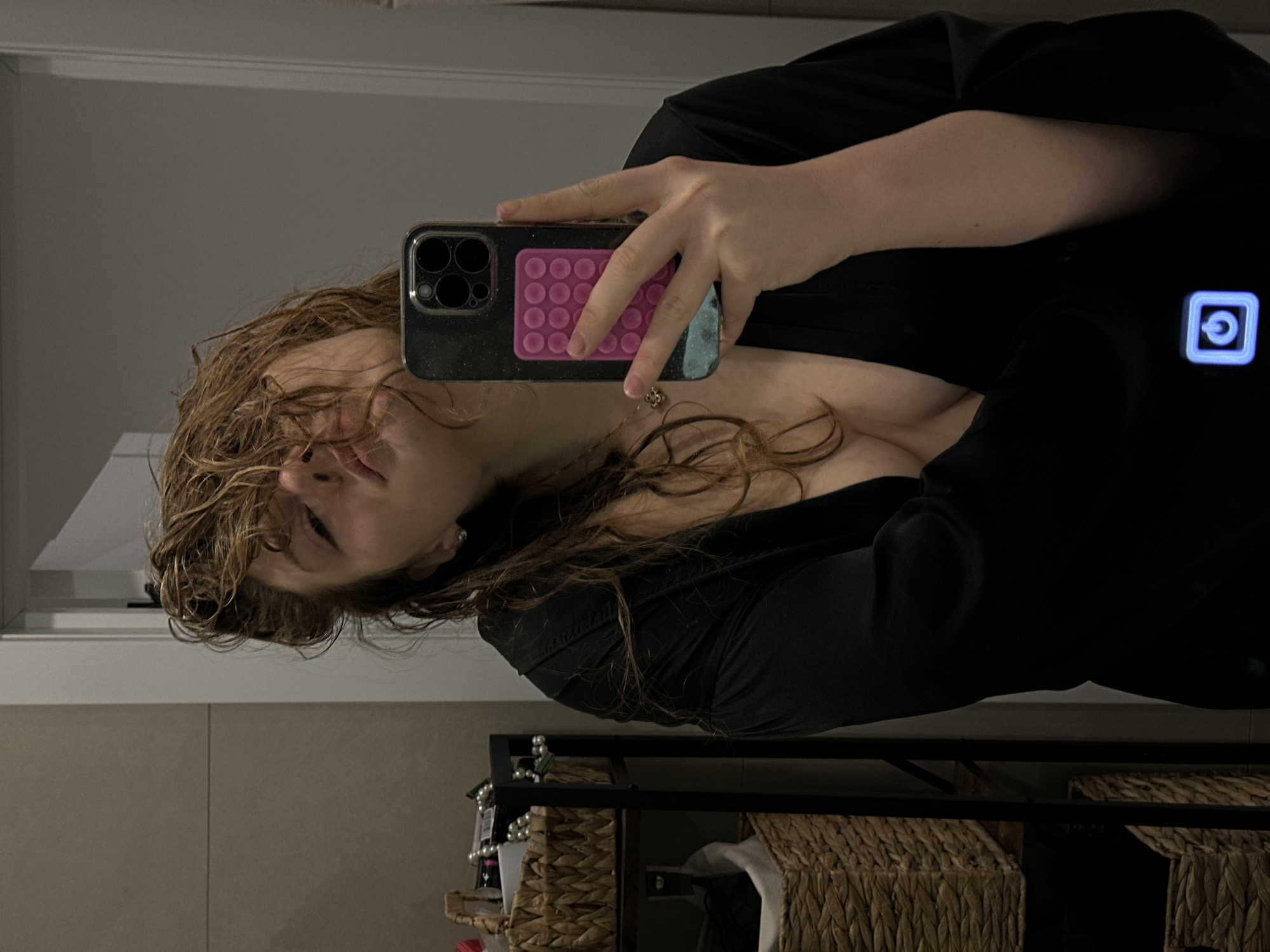Woman takes selfie in dressing area in Studenets, Russia