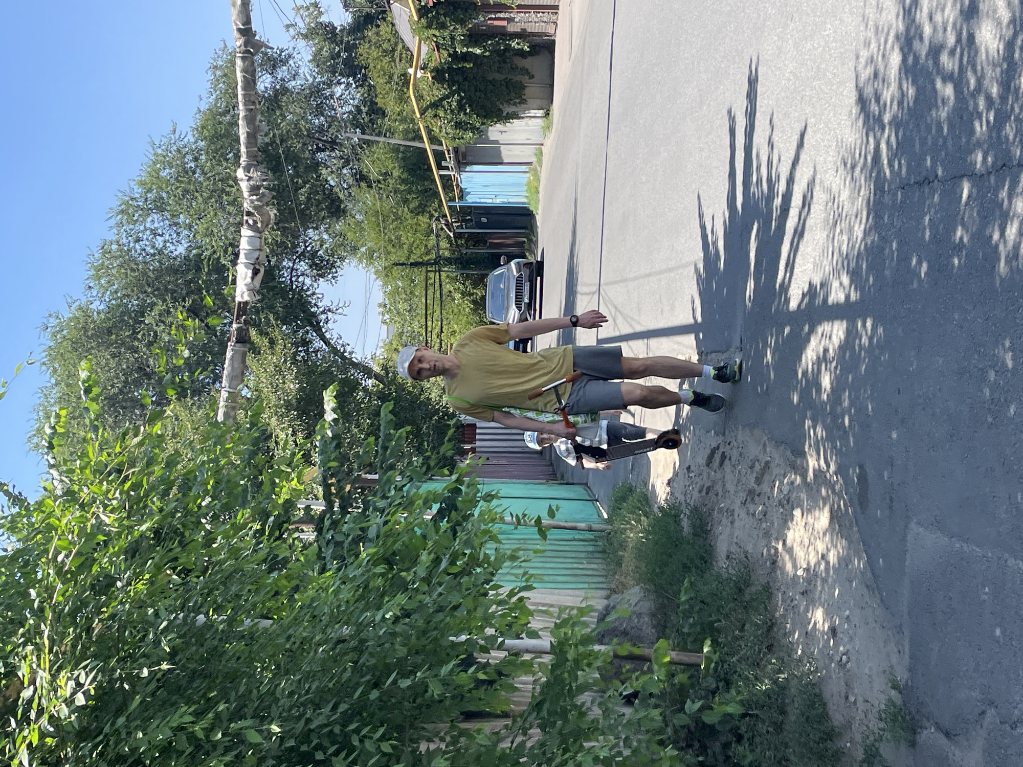 Quiet summer morning across Almaty's residential streets