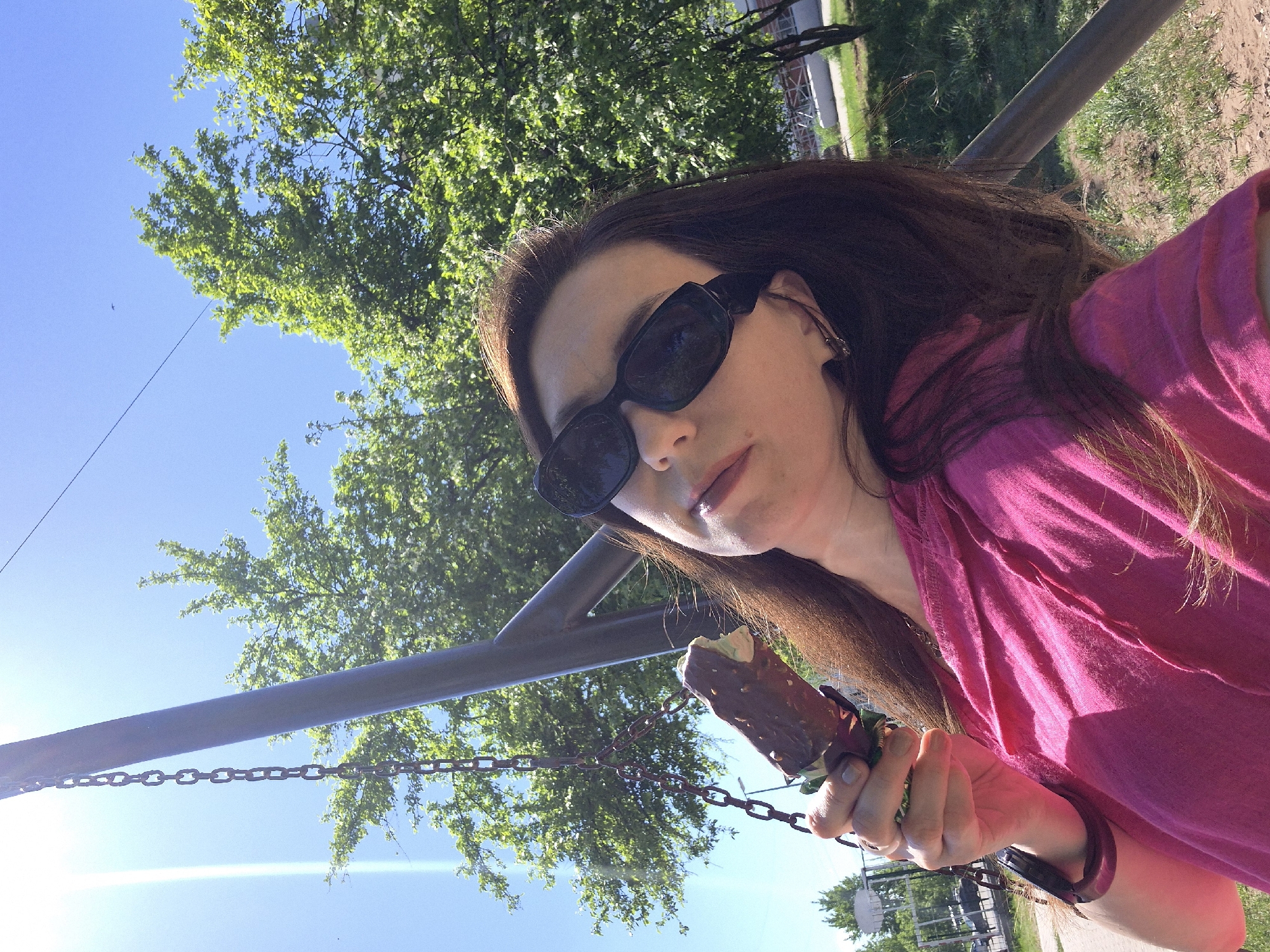 People enjoy ice cream and playground time in parks
