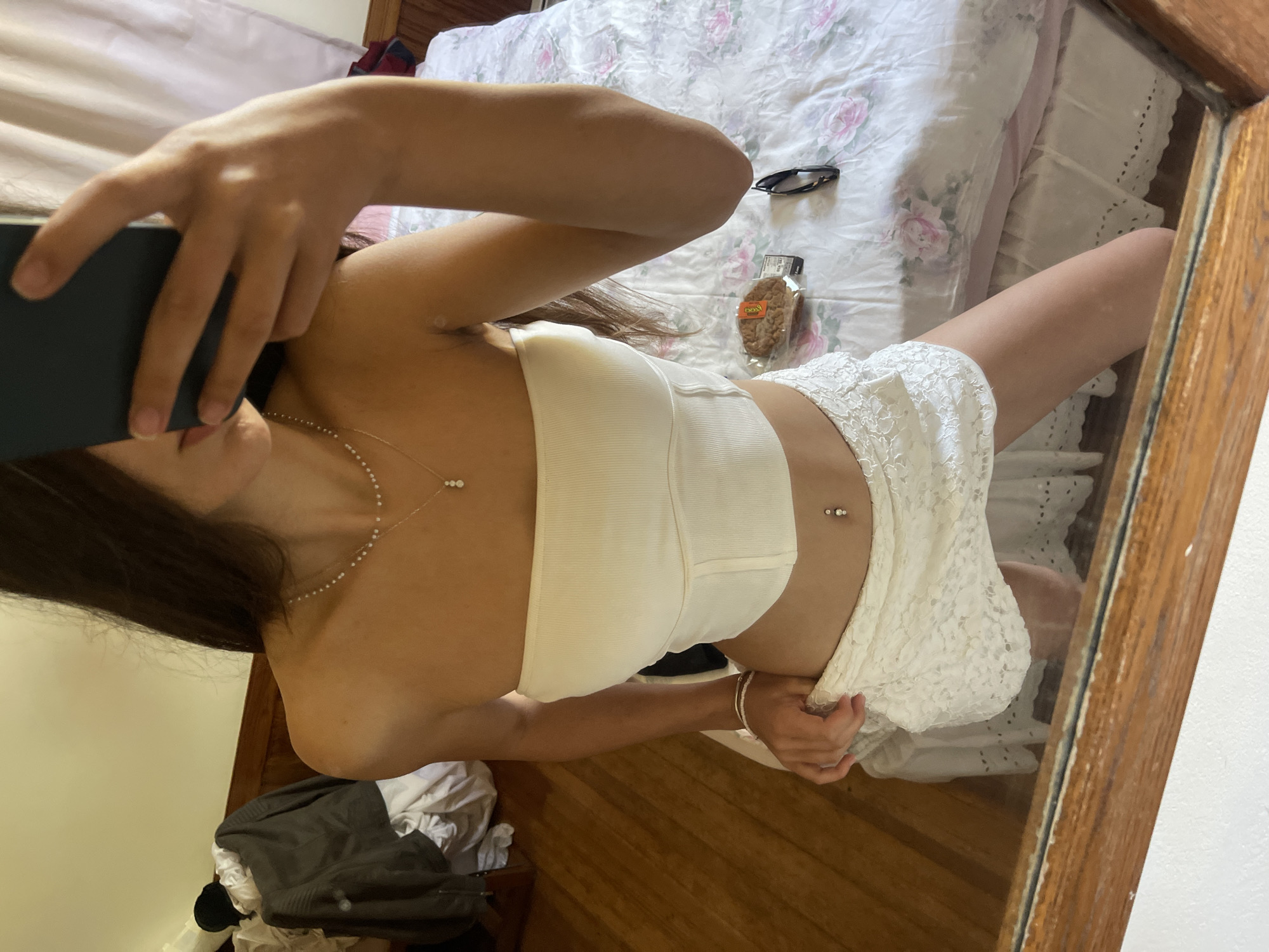 Mirror selfie in all-white outfit, Oak Bluffs bedroom