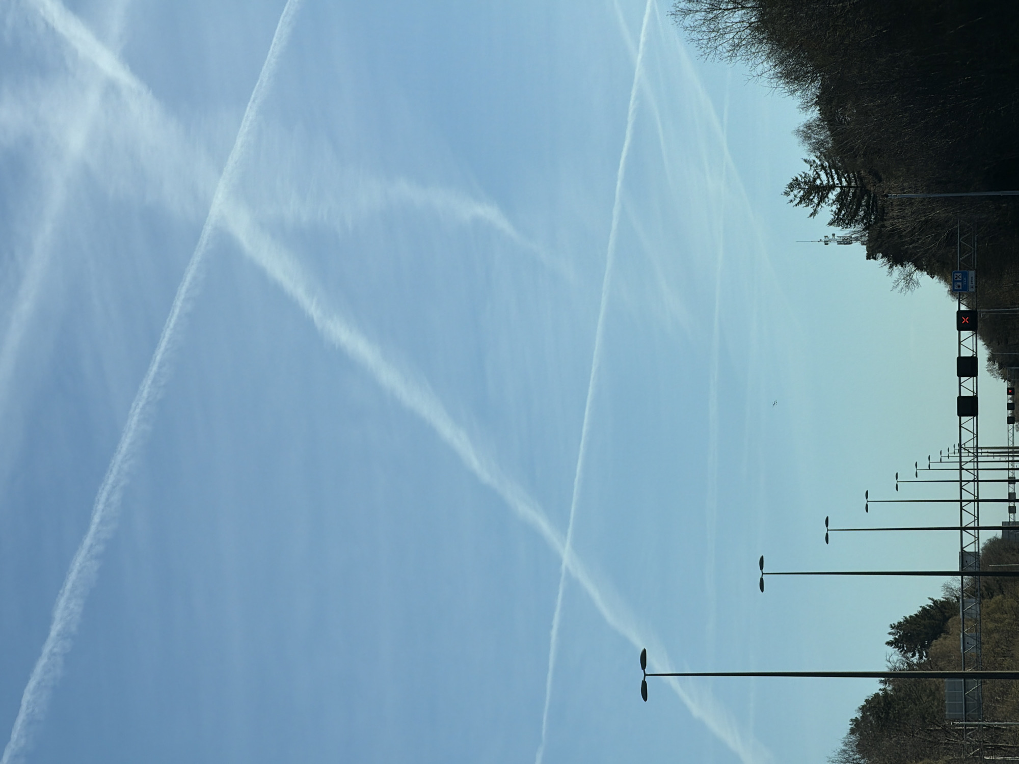 Multiple aircraft contrails spotted over Beekbergen highway