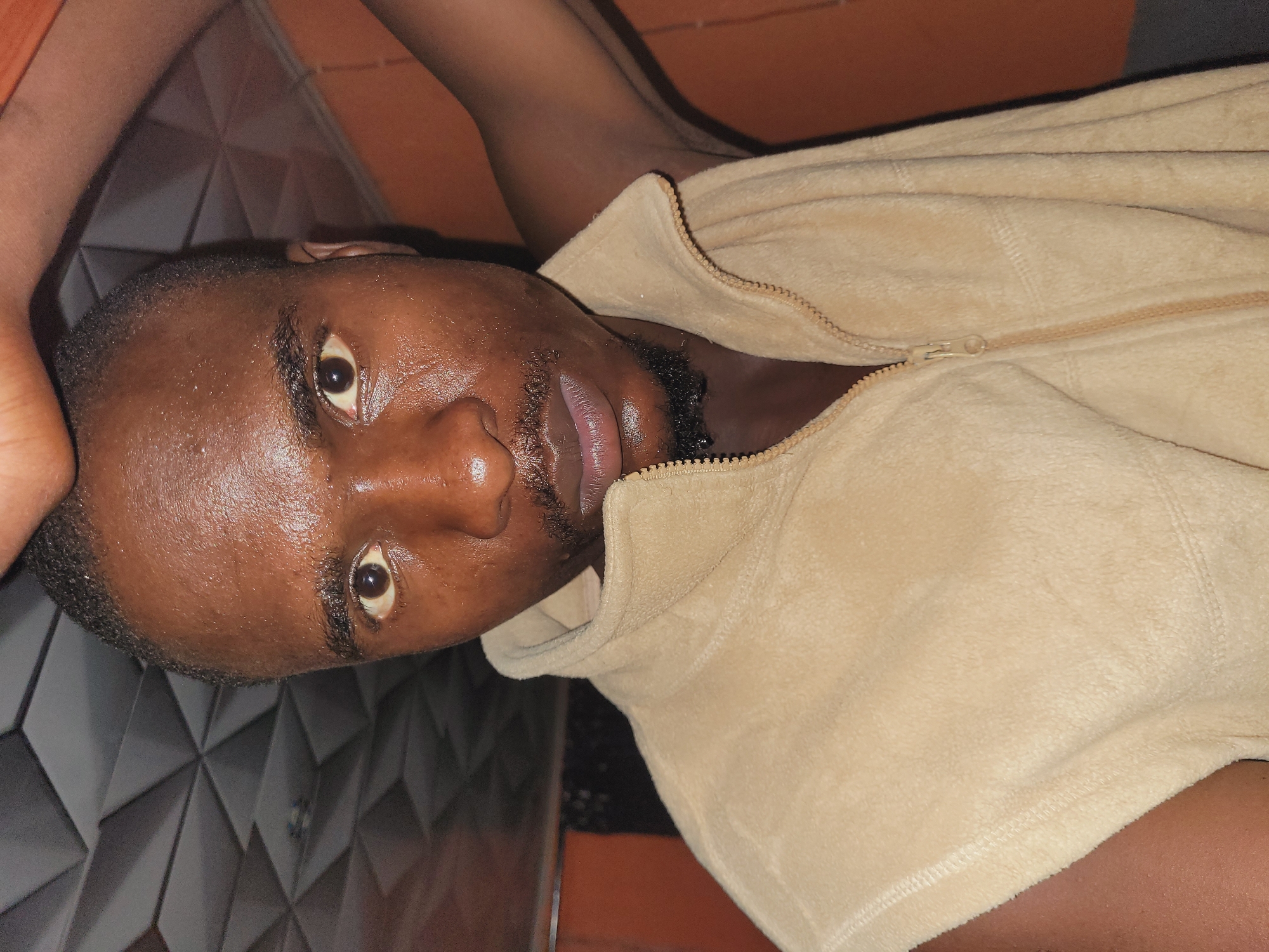 Casual indoor portraits from an evening in Bukuru, Nigeria