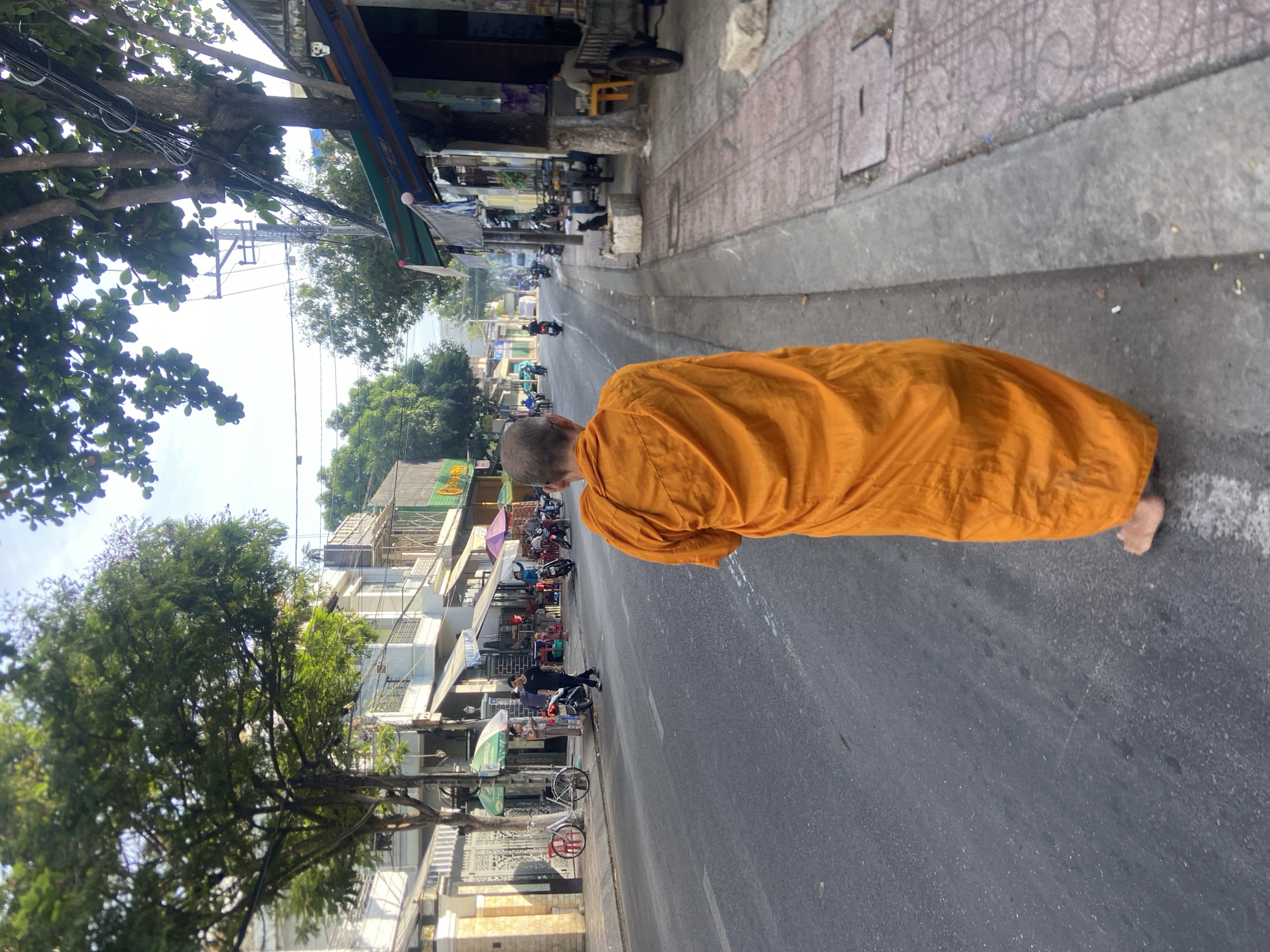 Buddhist monk on foot through Nha Trang streets