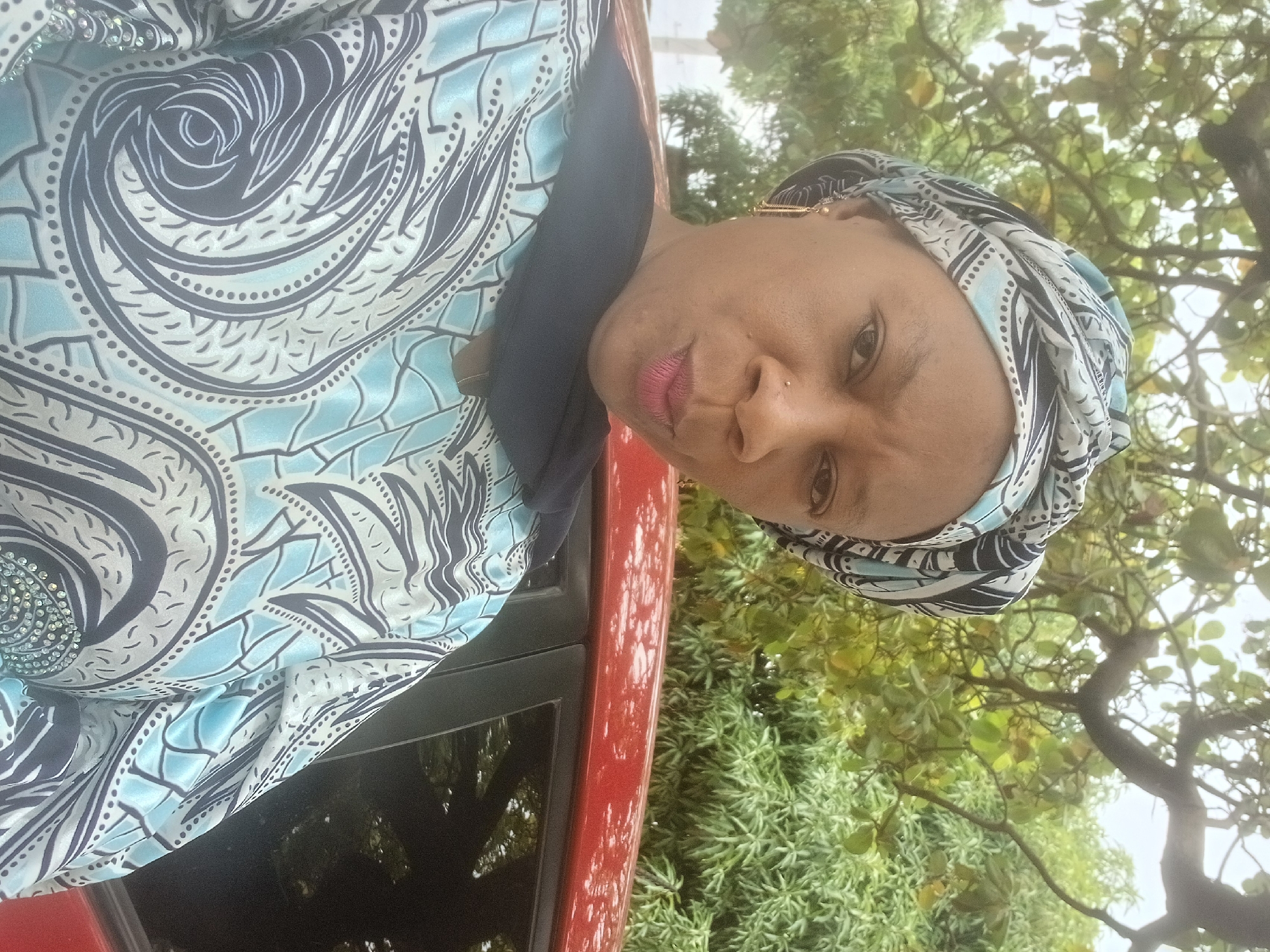 Woman photographed in multiple outdoor poses in Shaba, Nigeria