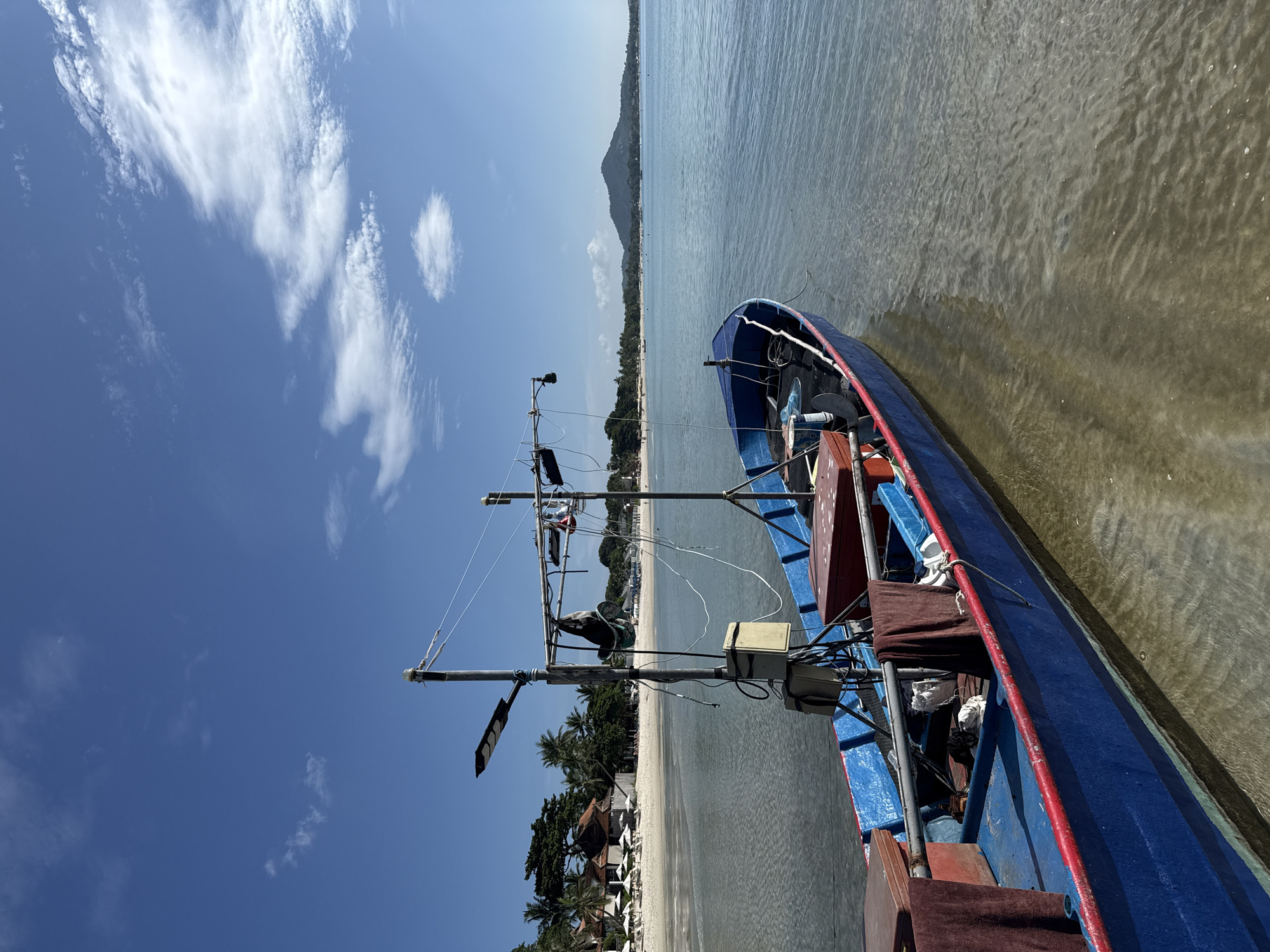 Fishing boat docked in calm Ko Samui coastal waters