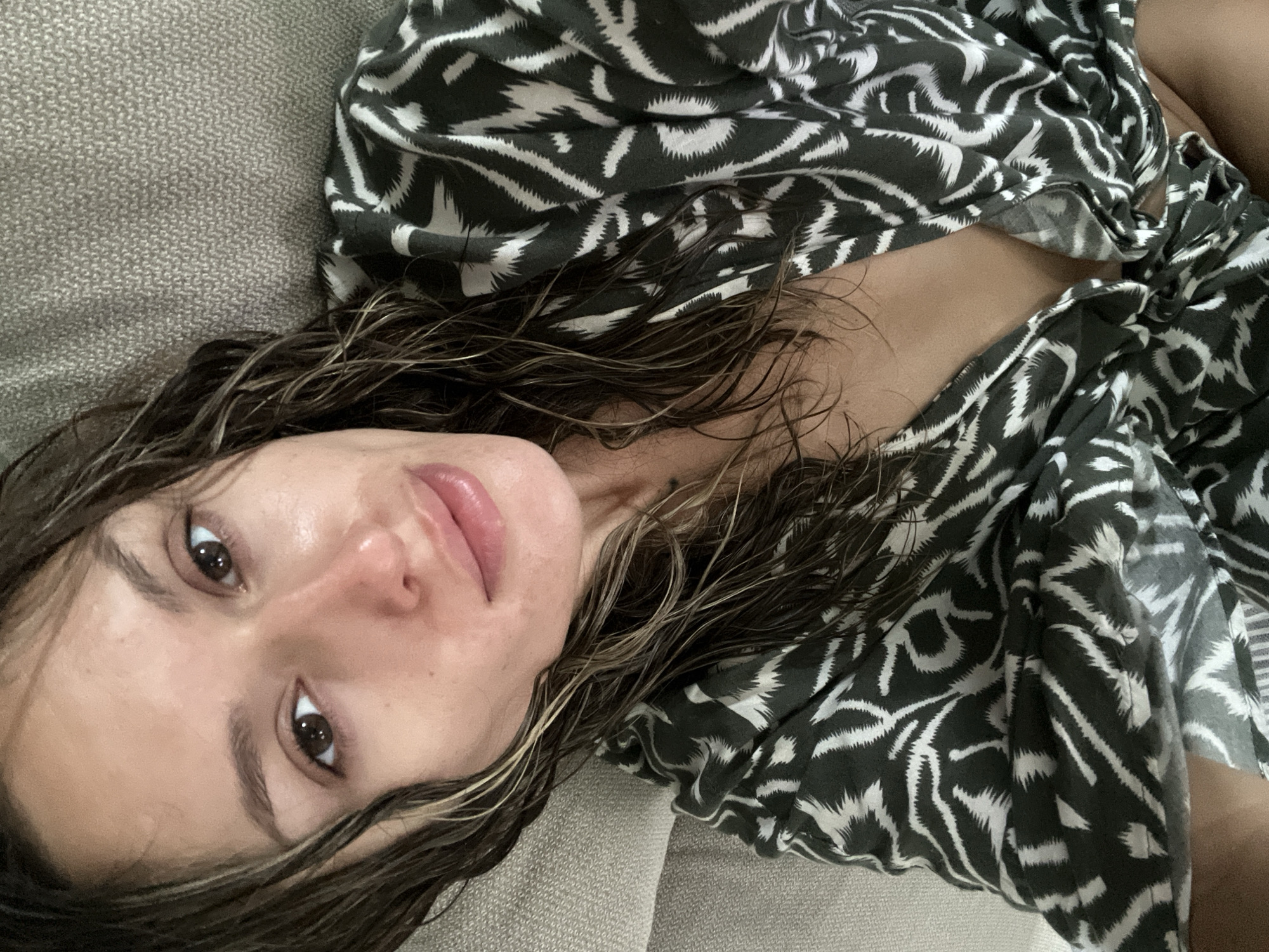 Post-shower relaxation at a Choeng Thale villa with juice and selfies