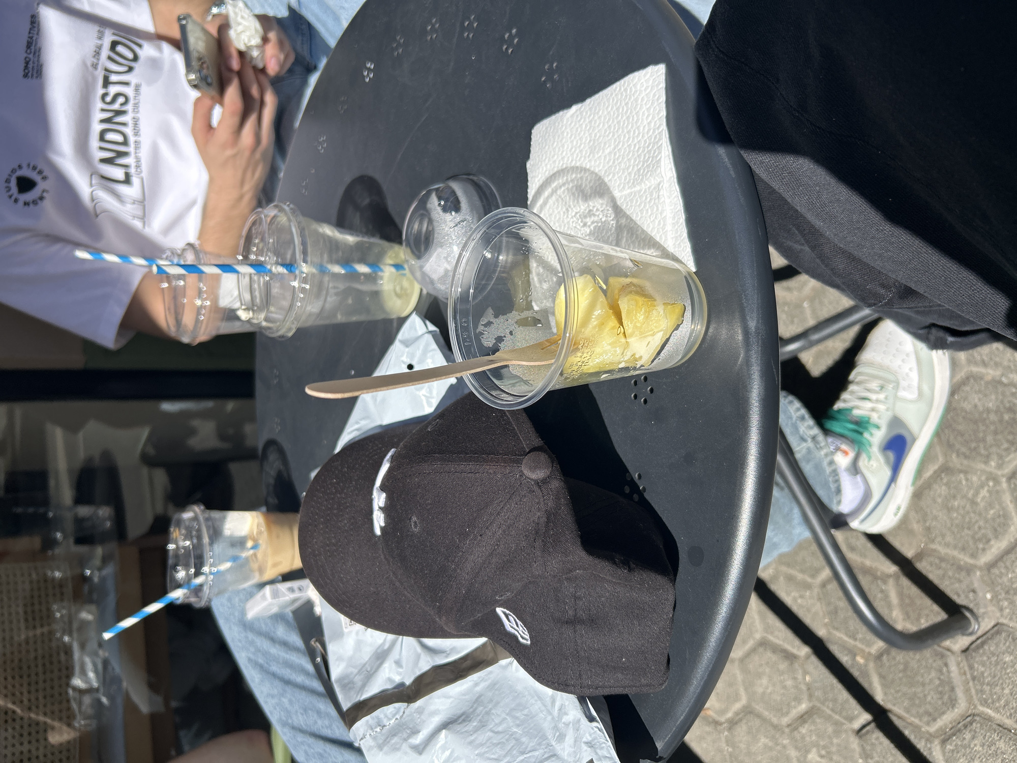 Two plastic cups with striped straws spotted on Sofia table