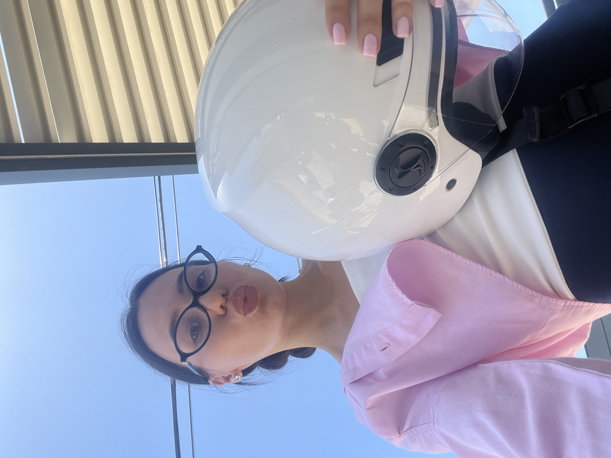 Helmet in hand, sunny stop in Palma de Mallorca
