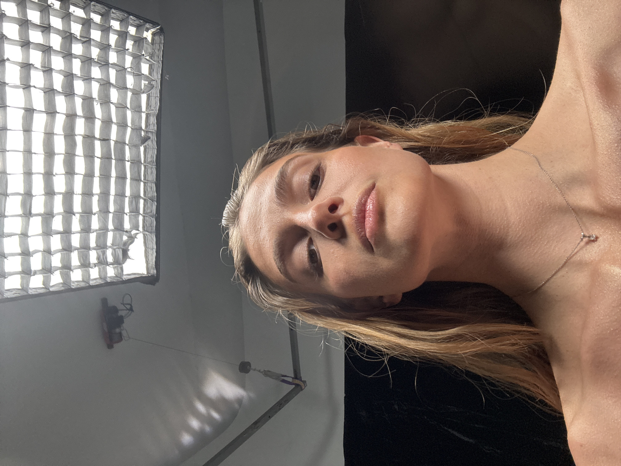 Photo shoot documented at Tbilisi studio with blonde model