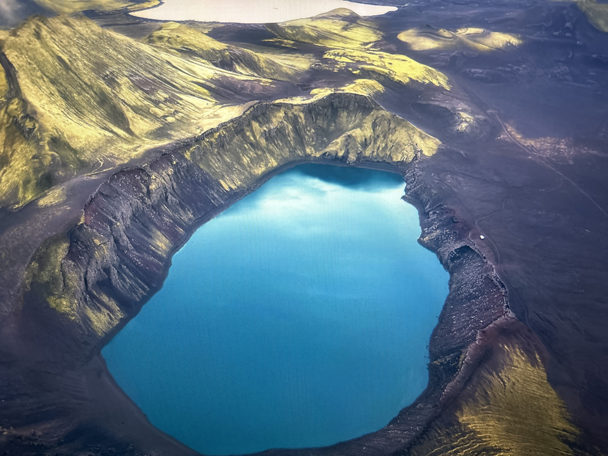 Aerial view captures volcanic crater lake near Kuala Lumpur