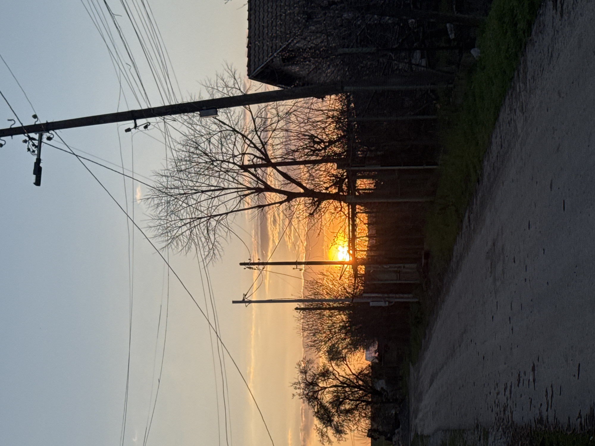 Sunset captured on rural dirt road in Bulgarian village