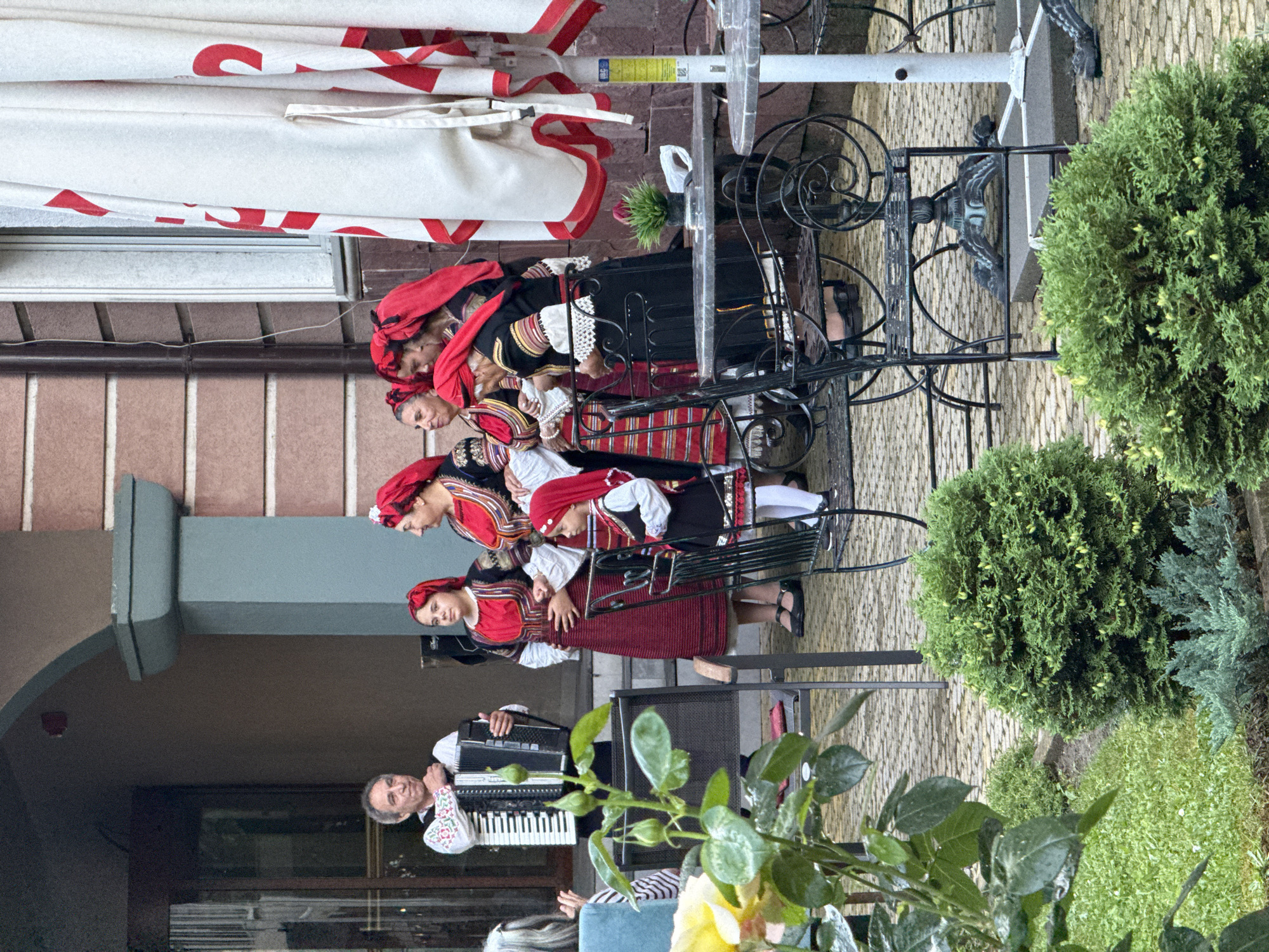 Folk musicians perform in traditional costumes in Kyustendil, Bulgaria