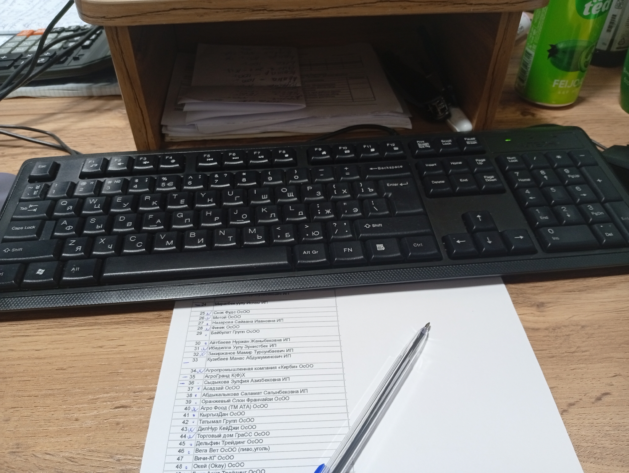 Desk work session in Osh, Kyrgyzstan with business software and notes