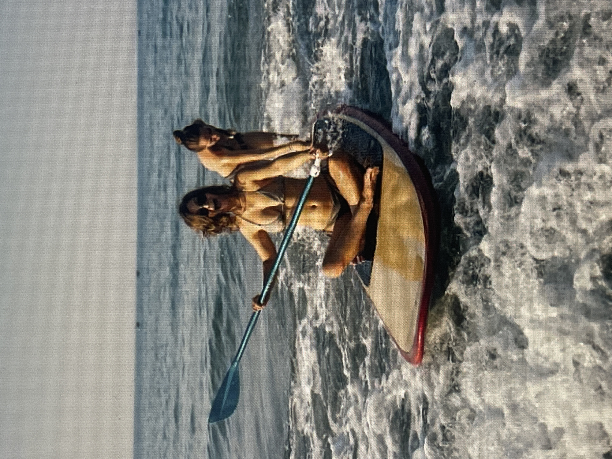 Beach day mix: paddleboarding, sunbathing, and a few odd ones out