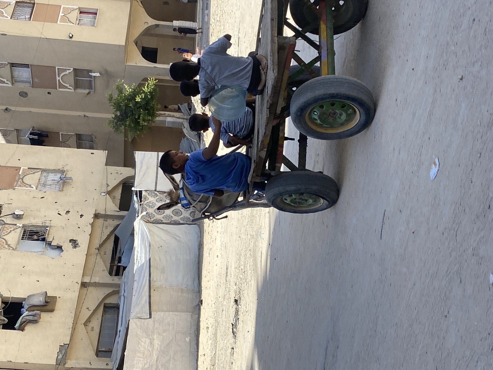 Construction machinery operations documented in Khan Yunis debris zones