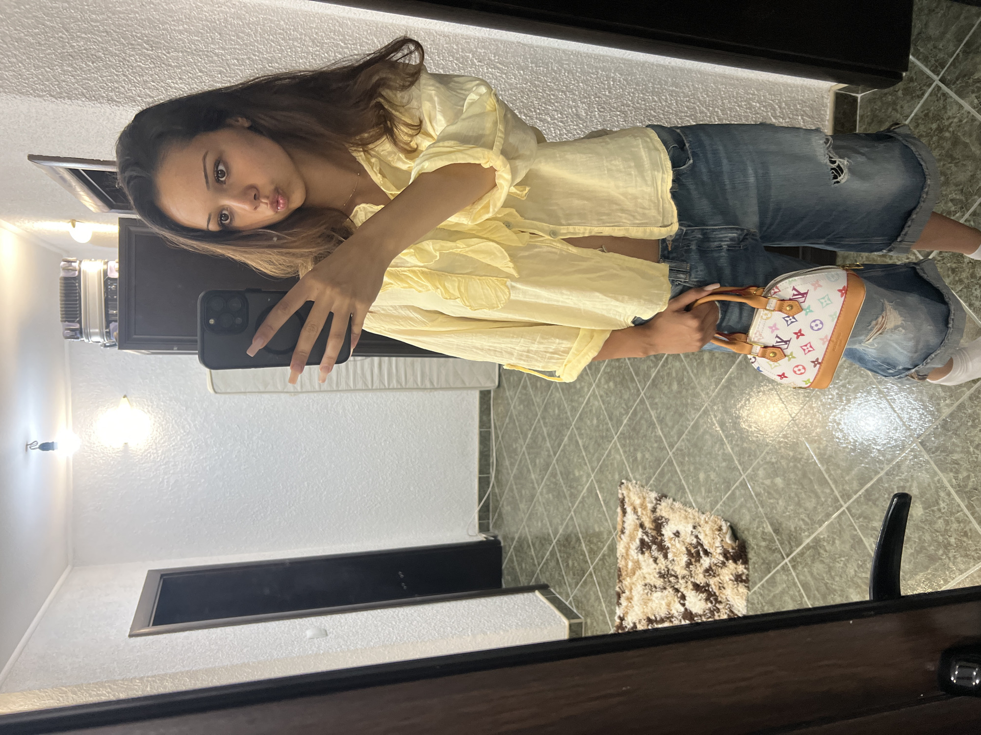 Mirror selfie session in Zlatograd, yellow ruffled blouse and denim