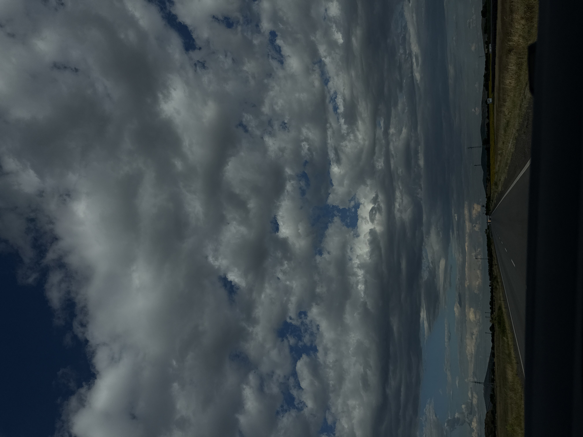 Open road under brooding storm clouds, Sliven, Bulgaria