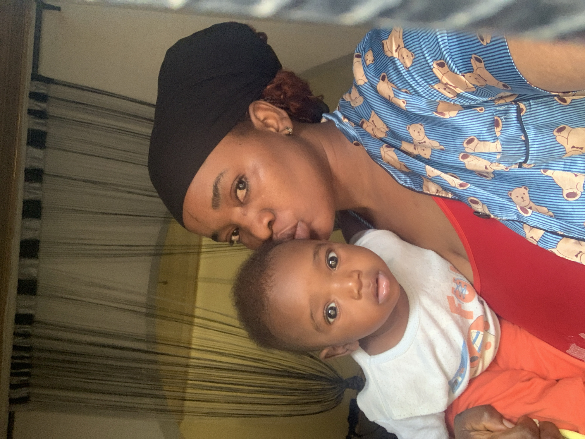 Mother and baby photographed in tender moments in Nigeria
