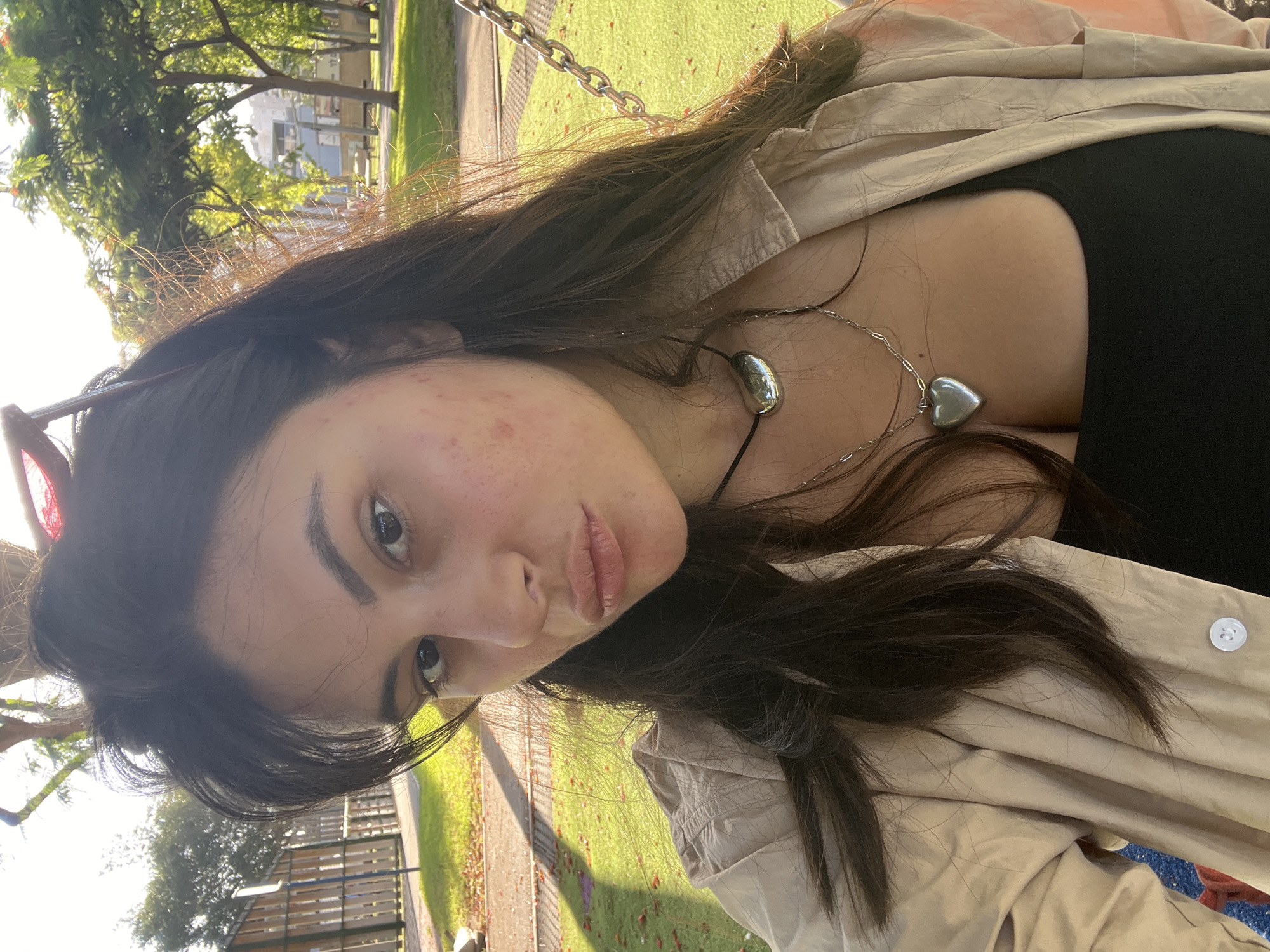 Afternoon at a Kiryat Bialik playground, selfies and merry-go-round.