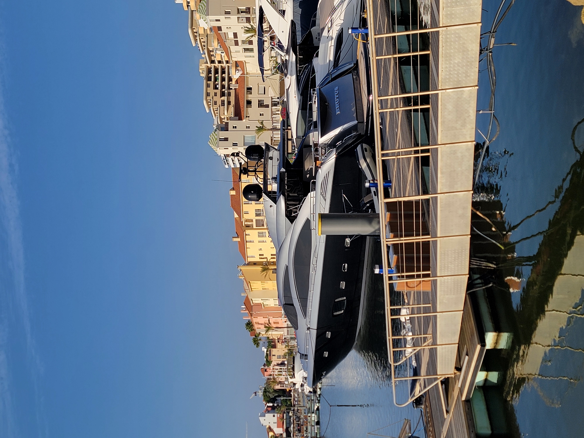 Busy afternoon at Quarteira marina, yachts, boats, and waterfront life