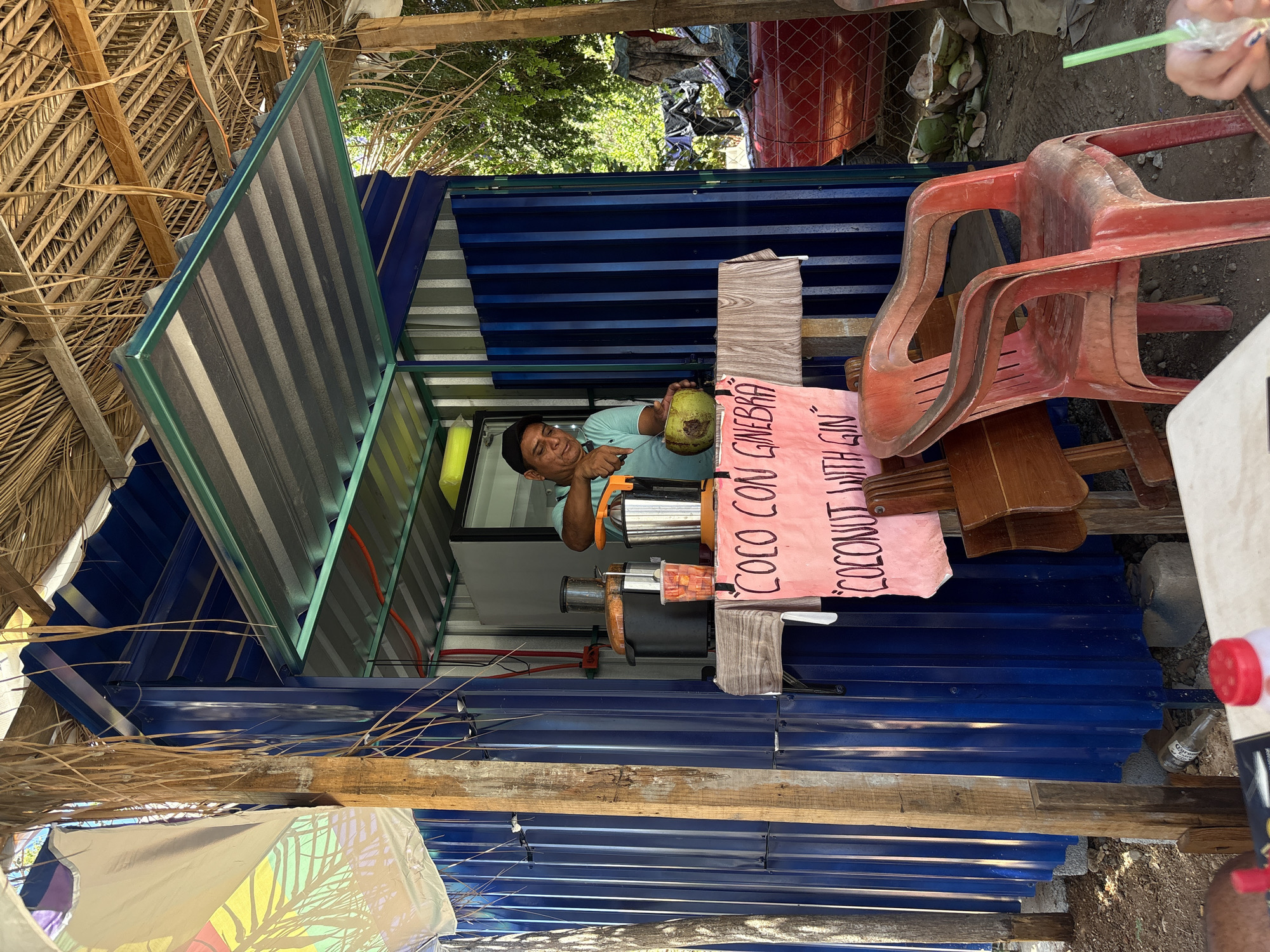 Street vendors sell watermelons and coconut drinks in Mexico
