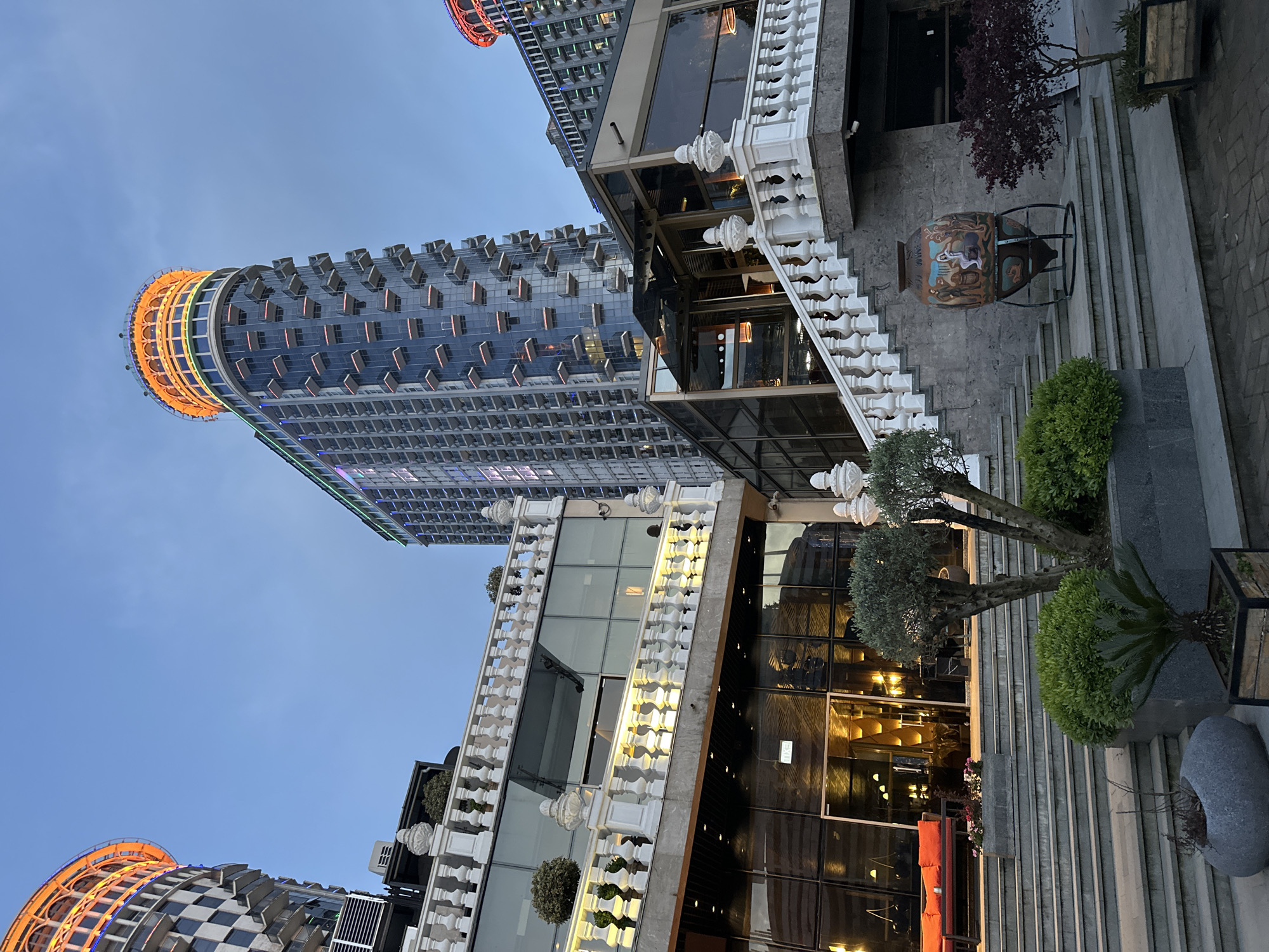 Evening stroll captures Batumi skyline, waterfront, and partial eclipse