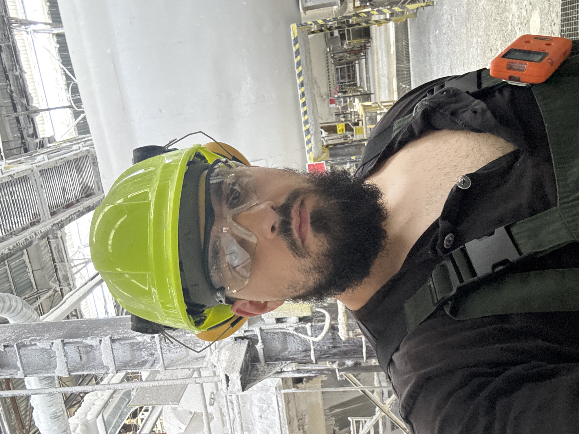 PPE-suited worker on the job in industrial Devnya, Bulgaria