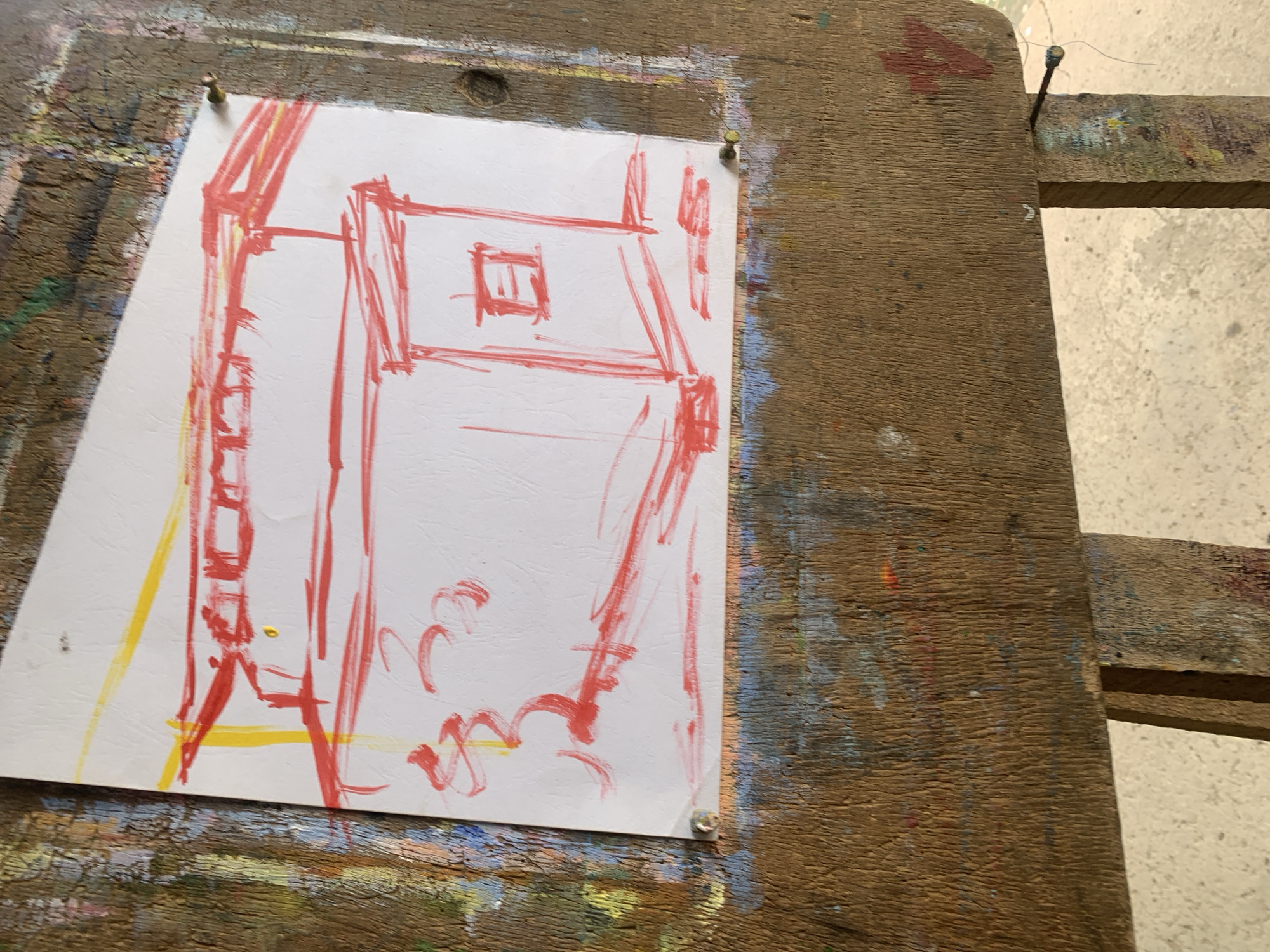 Outdoor painting session in progress at a Jos art space