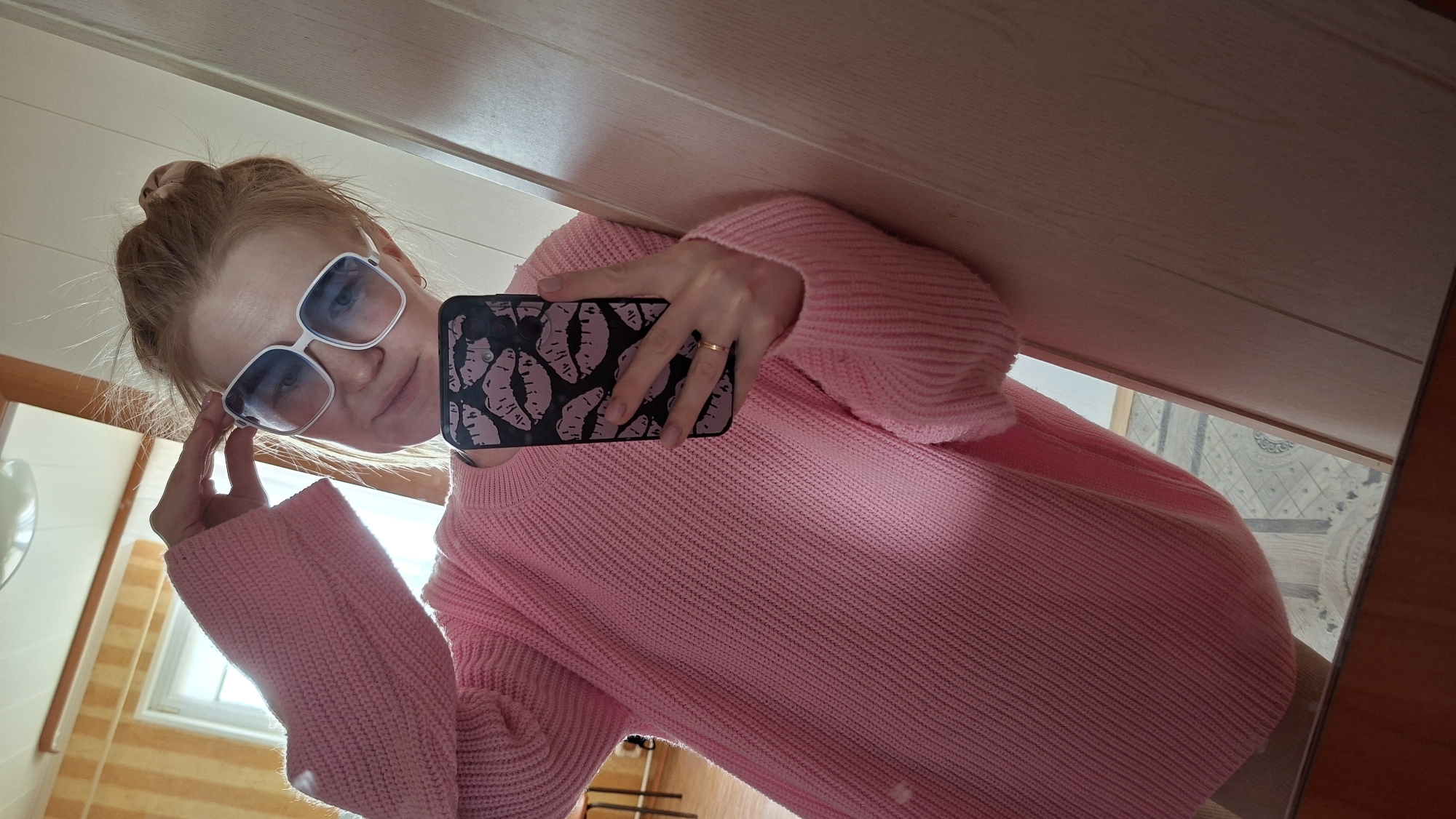 Woman takes mirror selfie in Большой Букор, Russia