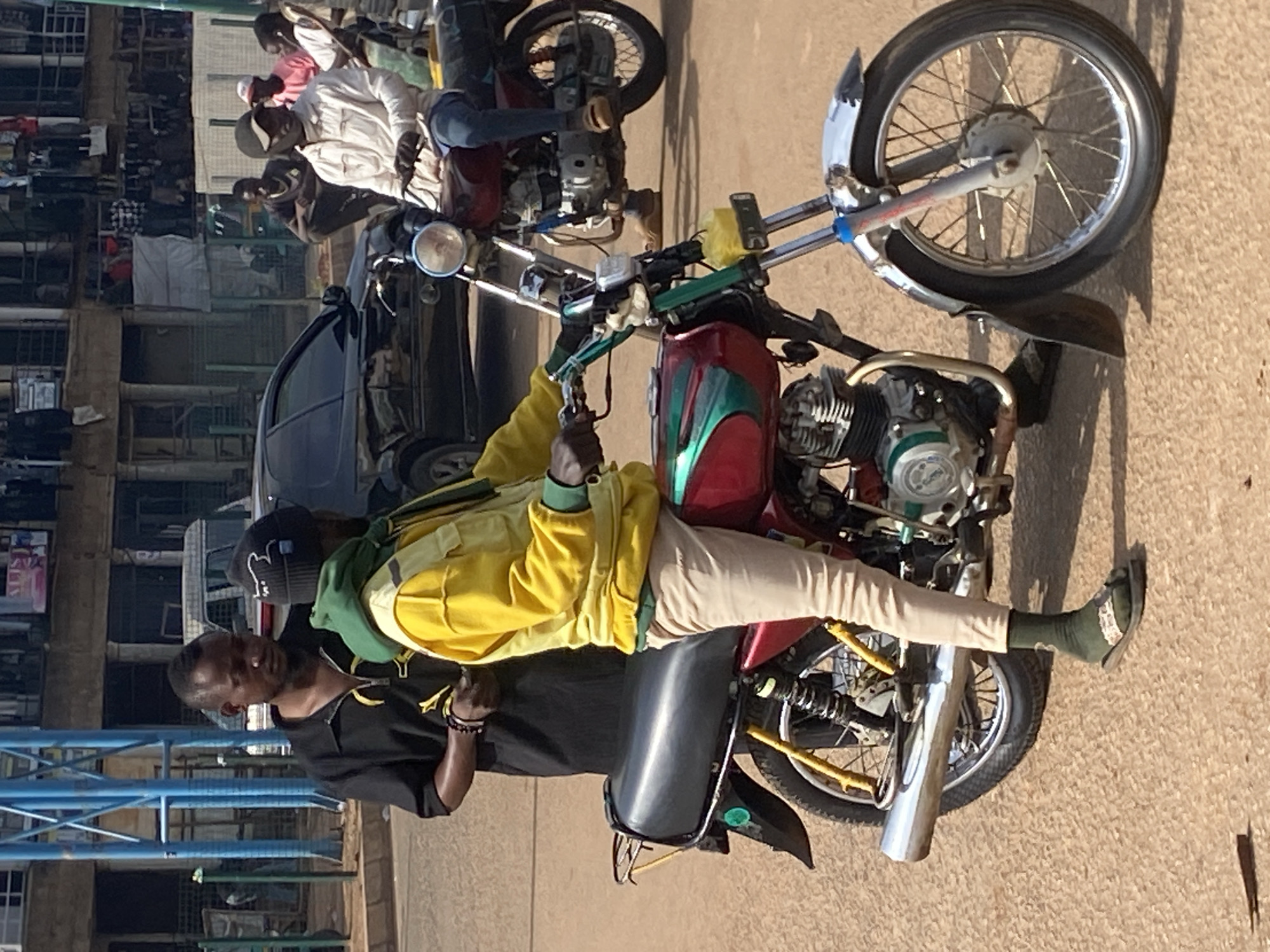 Street life and commerce in Bukuru, Nigeria on a July morning