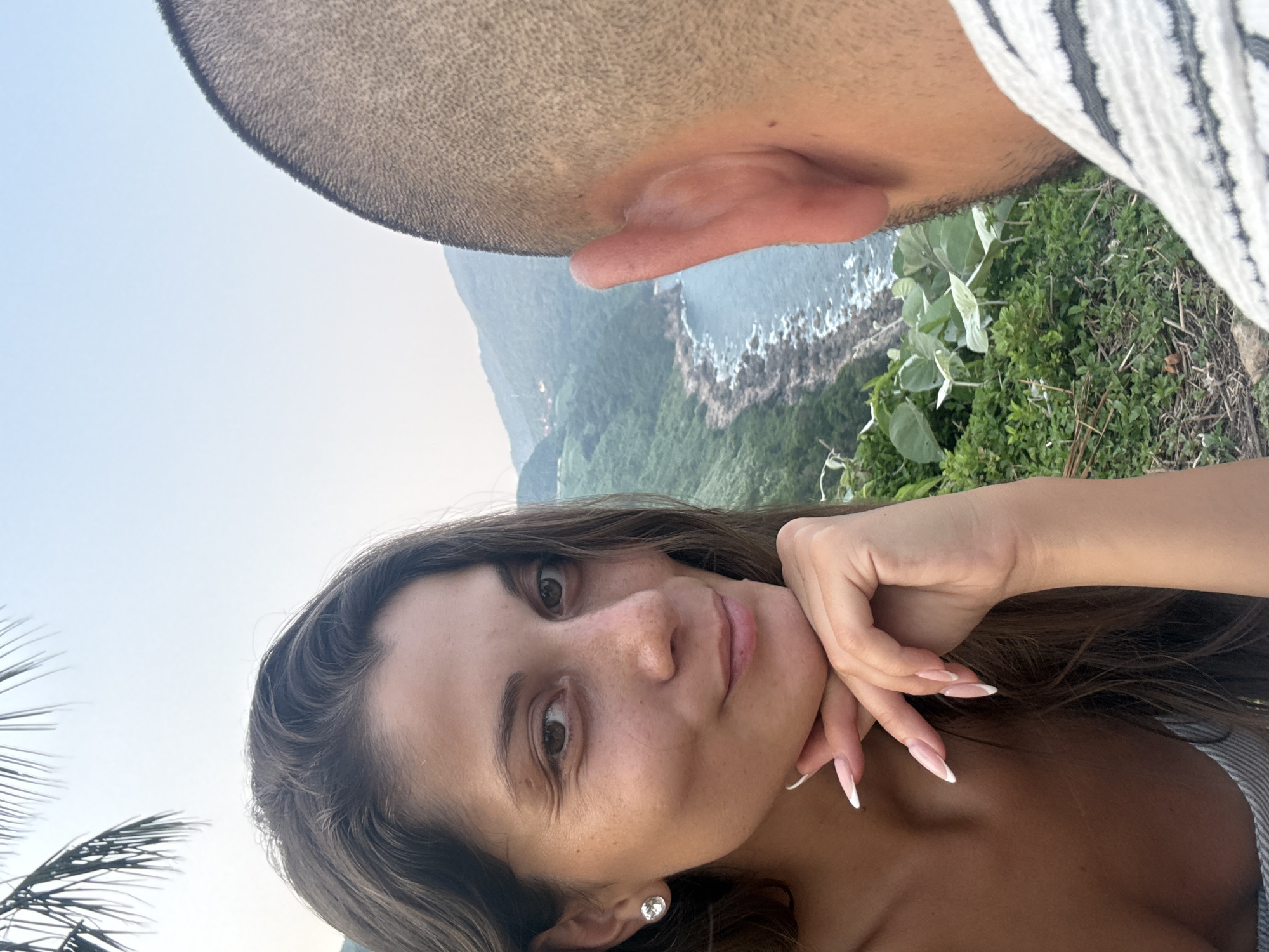 Woman takes selfies in coastal Đà Nẵng setting