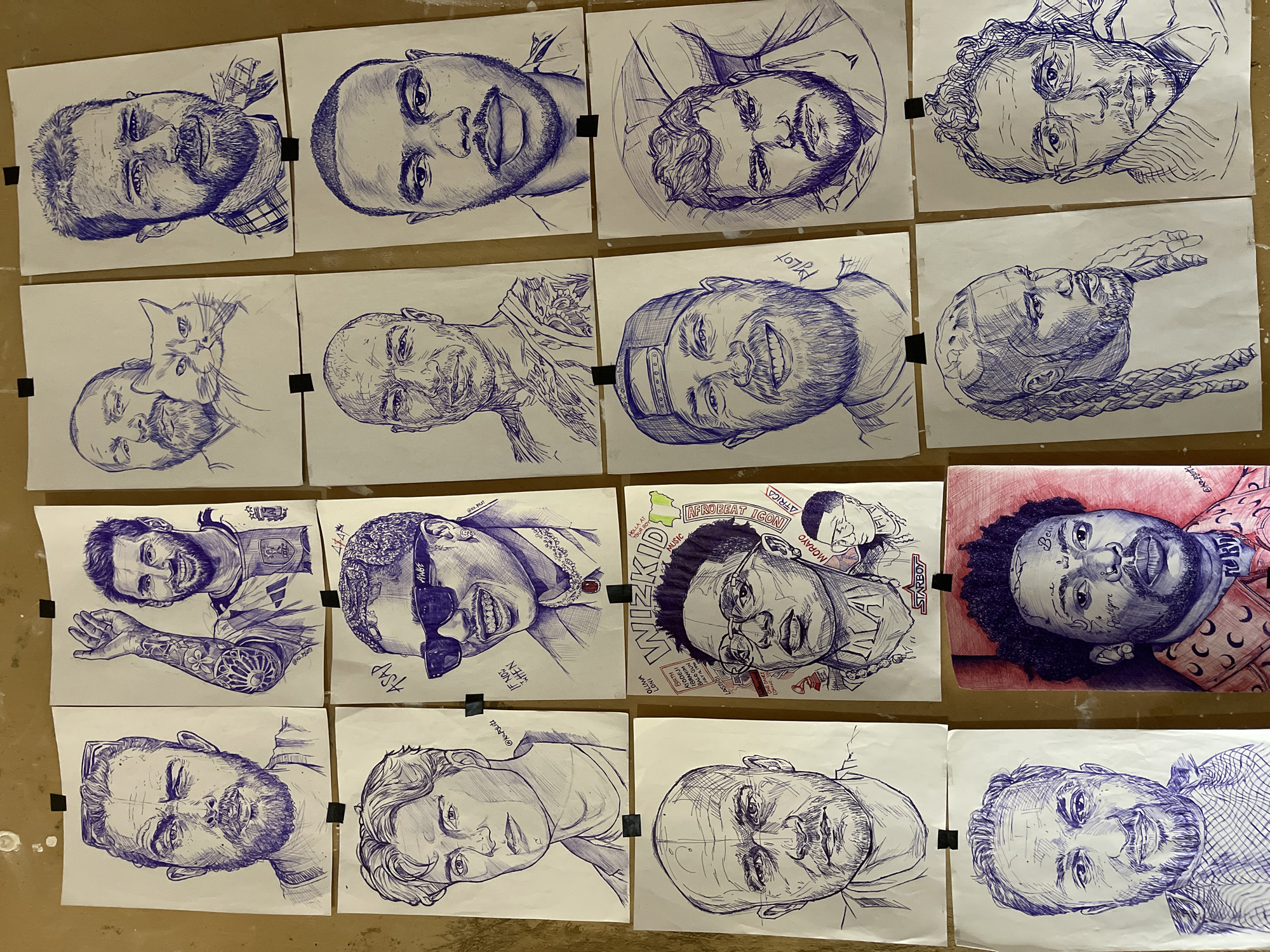 Pen-and-ink portrait drawings displayed in Jos, Nigeria