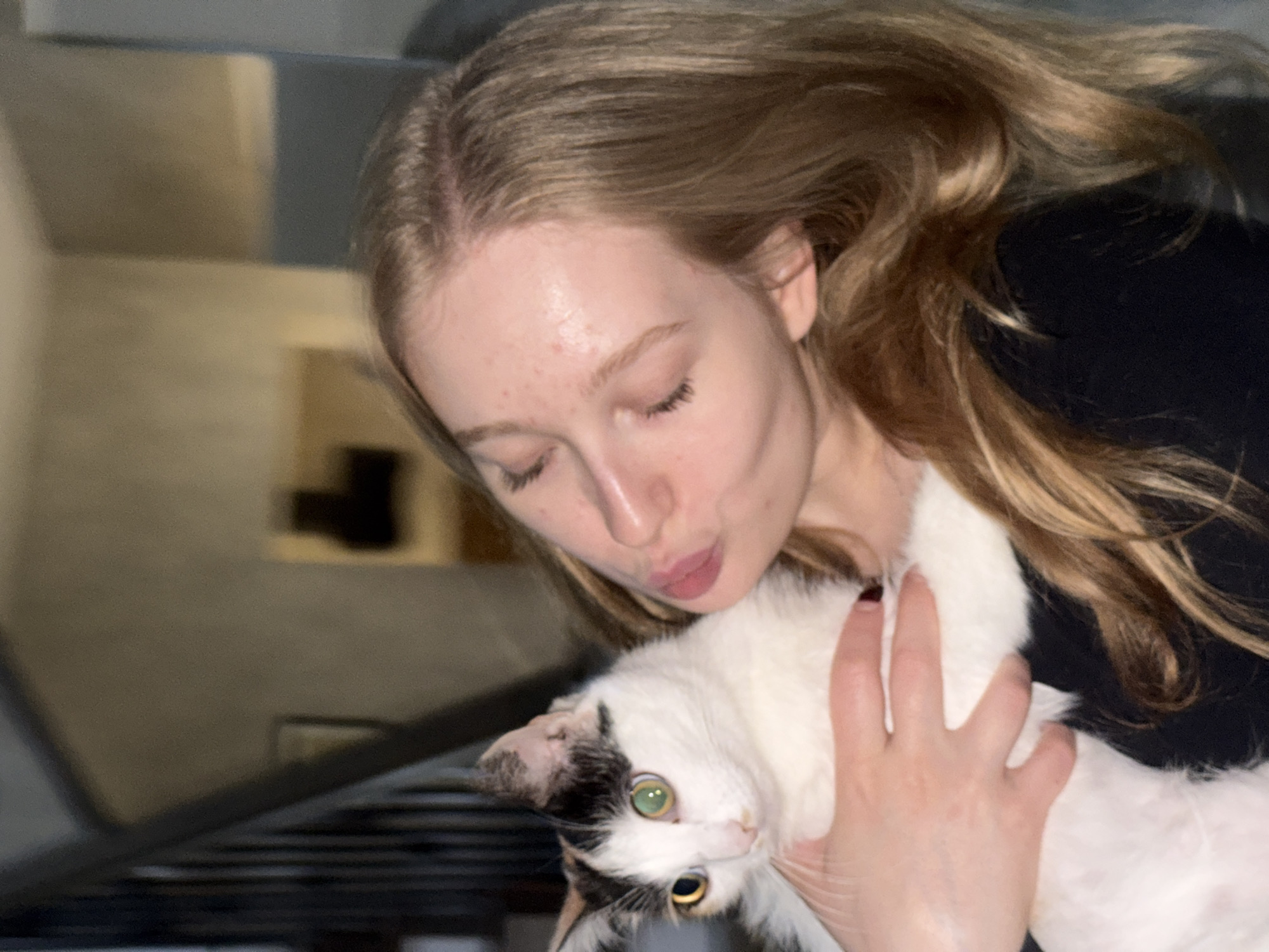Woman takes selfies, shares tender moment with cat in Russia