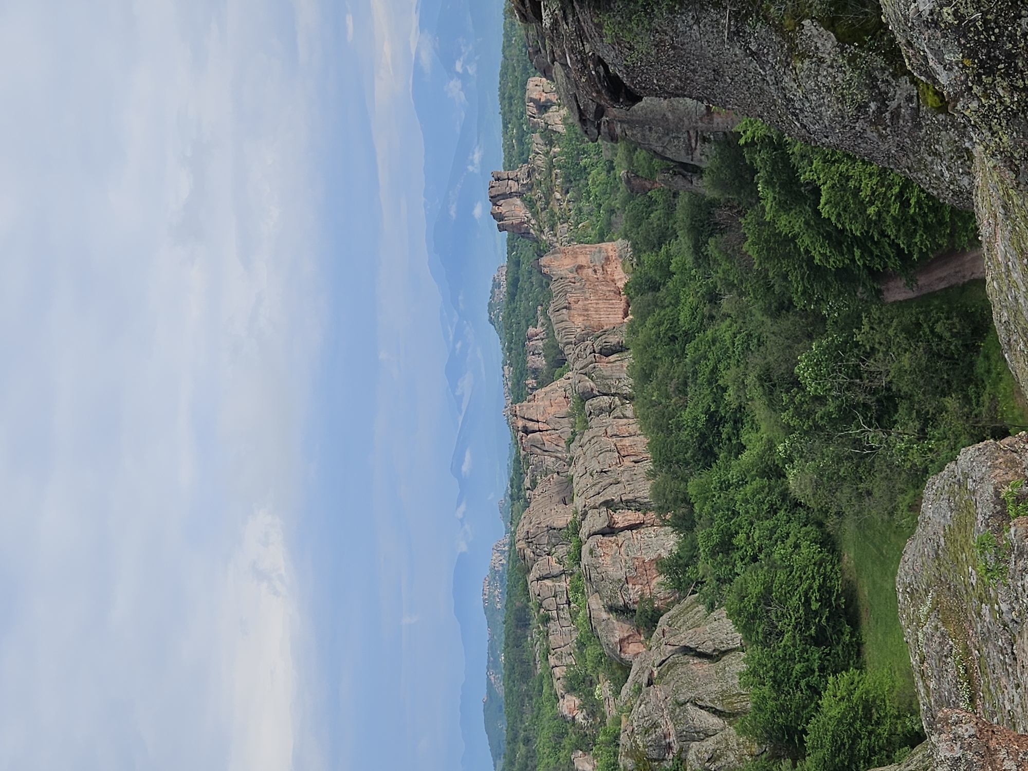 Tourist photographs Belogradchik Rocks geological formation in Bulgaria